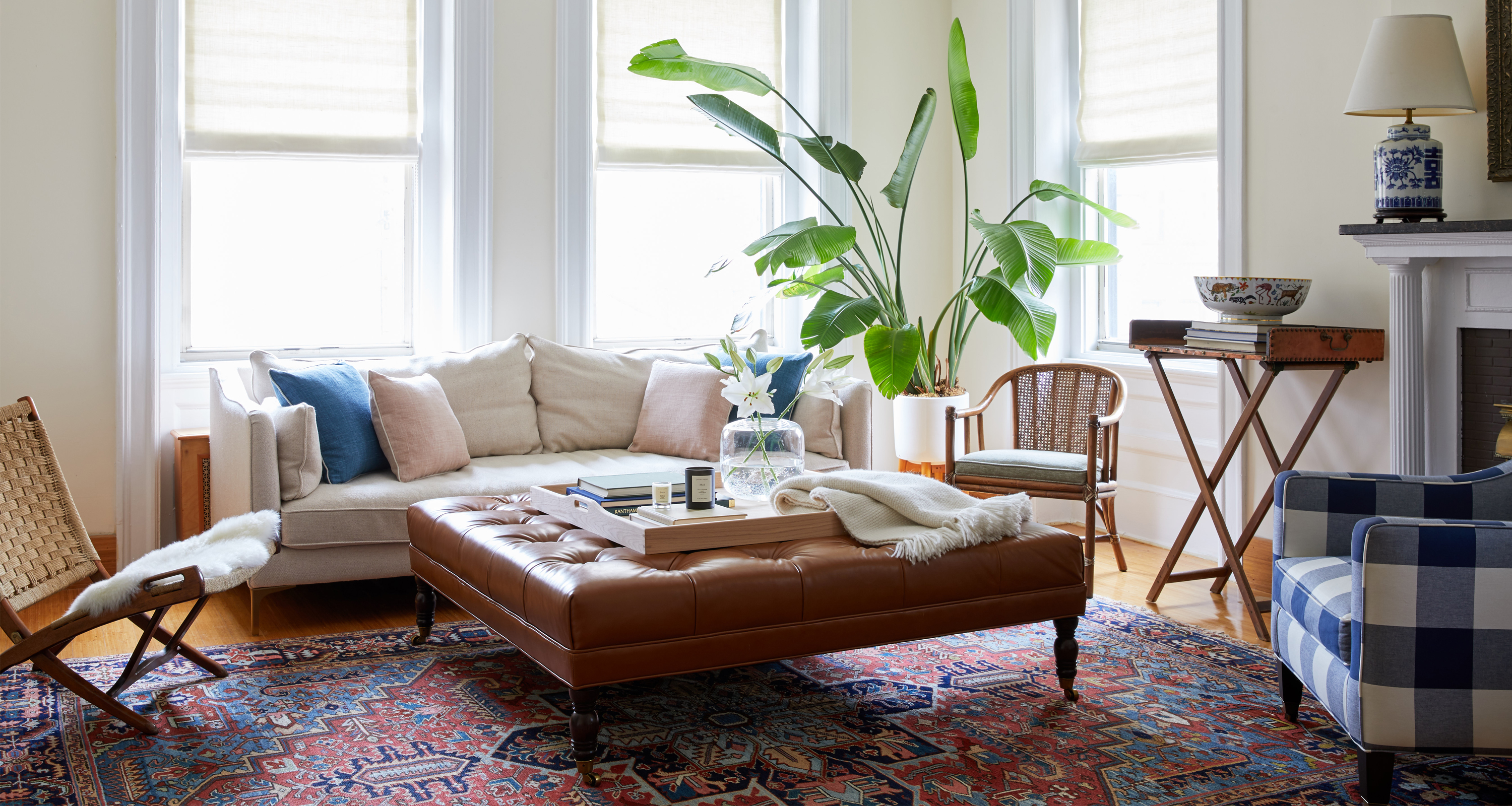 Wovn Home founder Davina Pike's living room with leather coffee table and white couch.