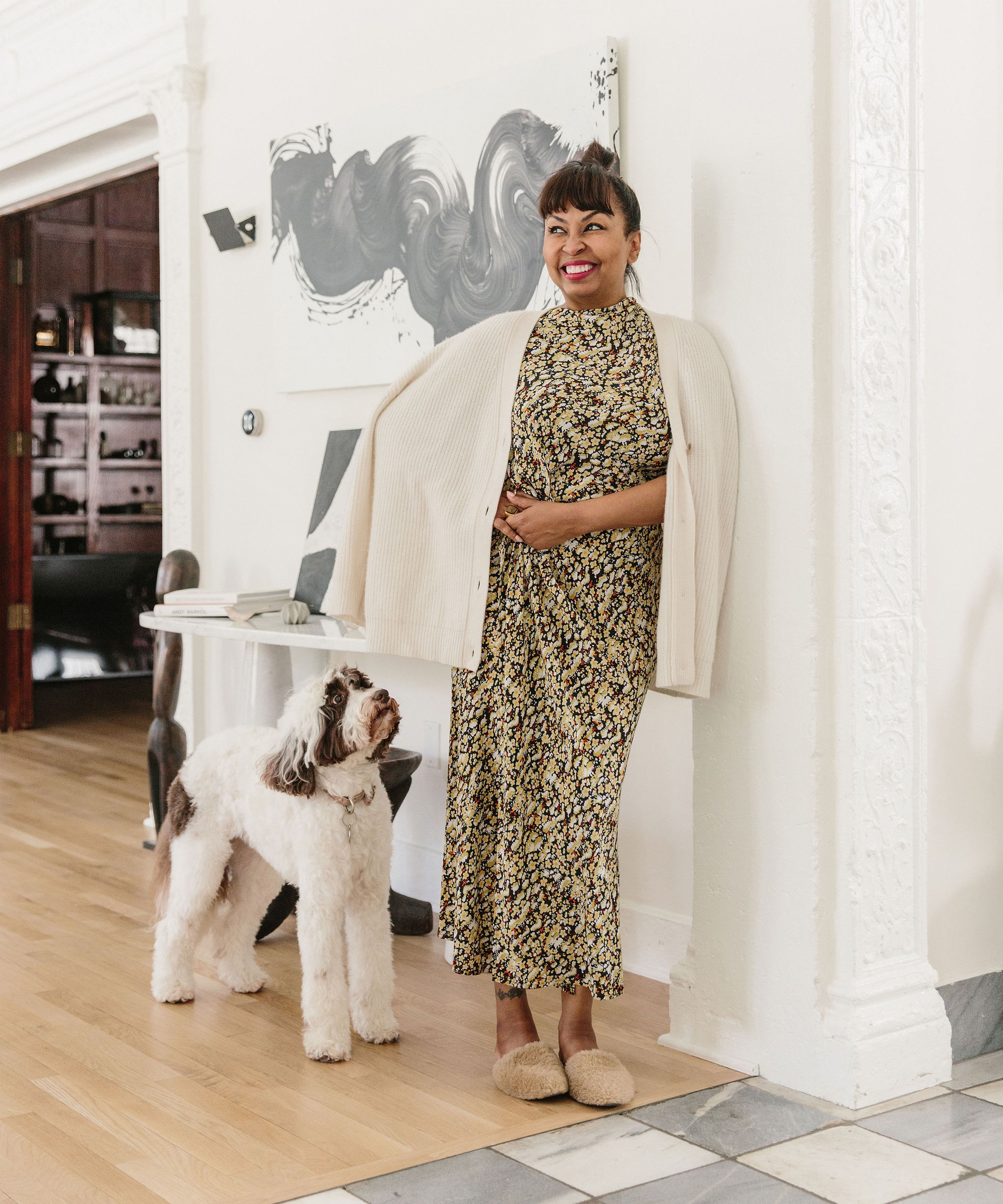 Brigette Romanek posing with dog in entryway of her Laurel Canyon home