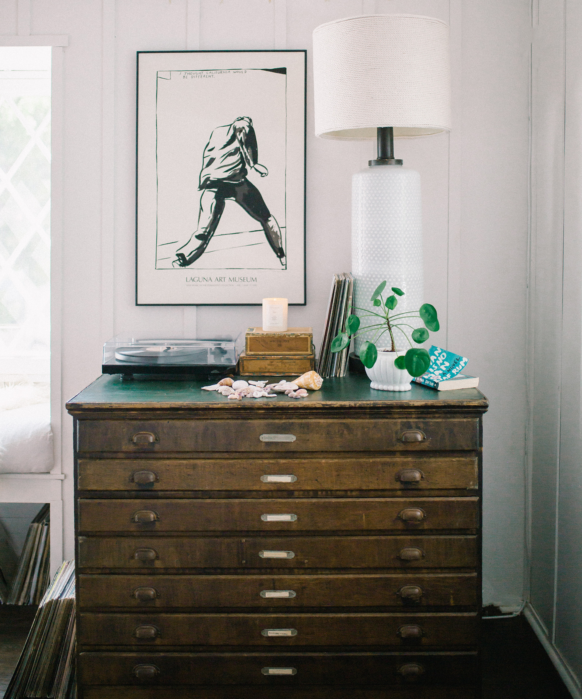 image of alexis garrett's living room with vintage drawers.