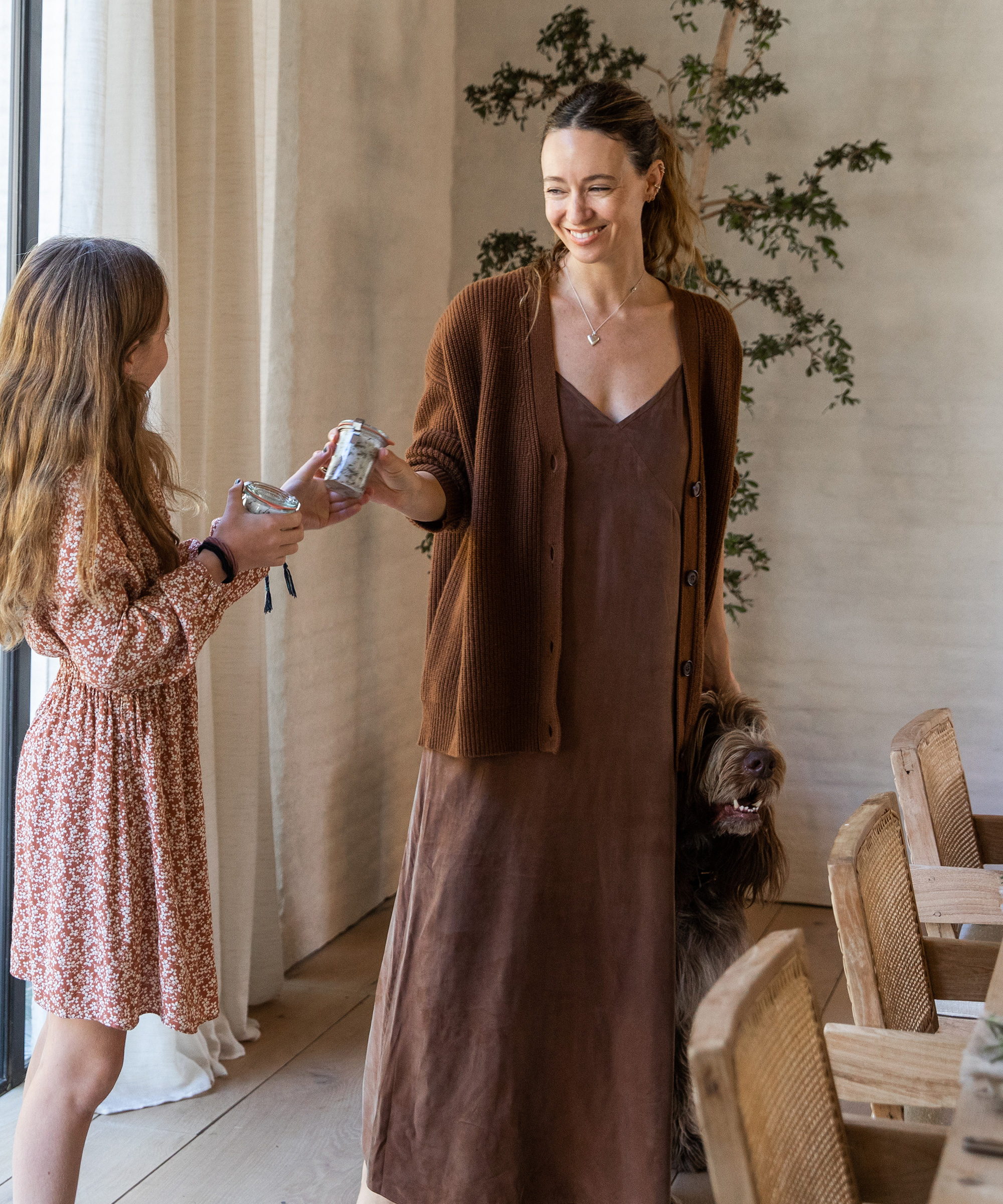 jenni and ripley standing in the dining room