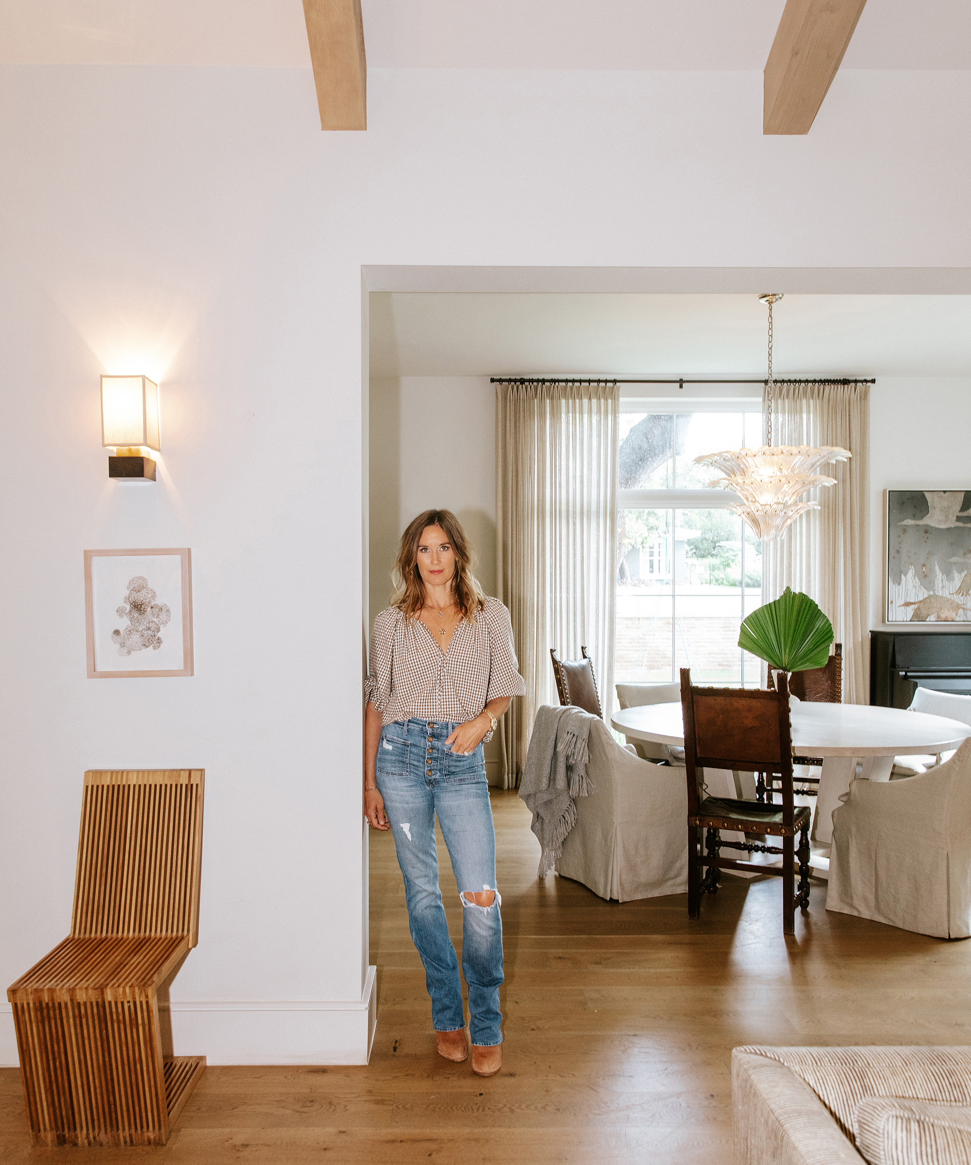 image of emily seiders standing in her living room