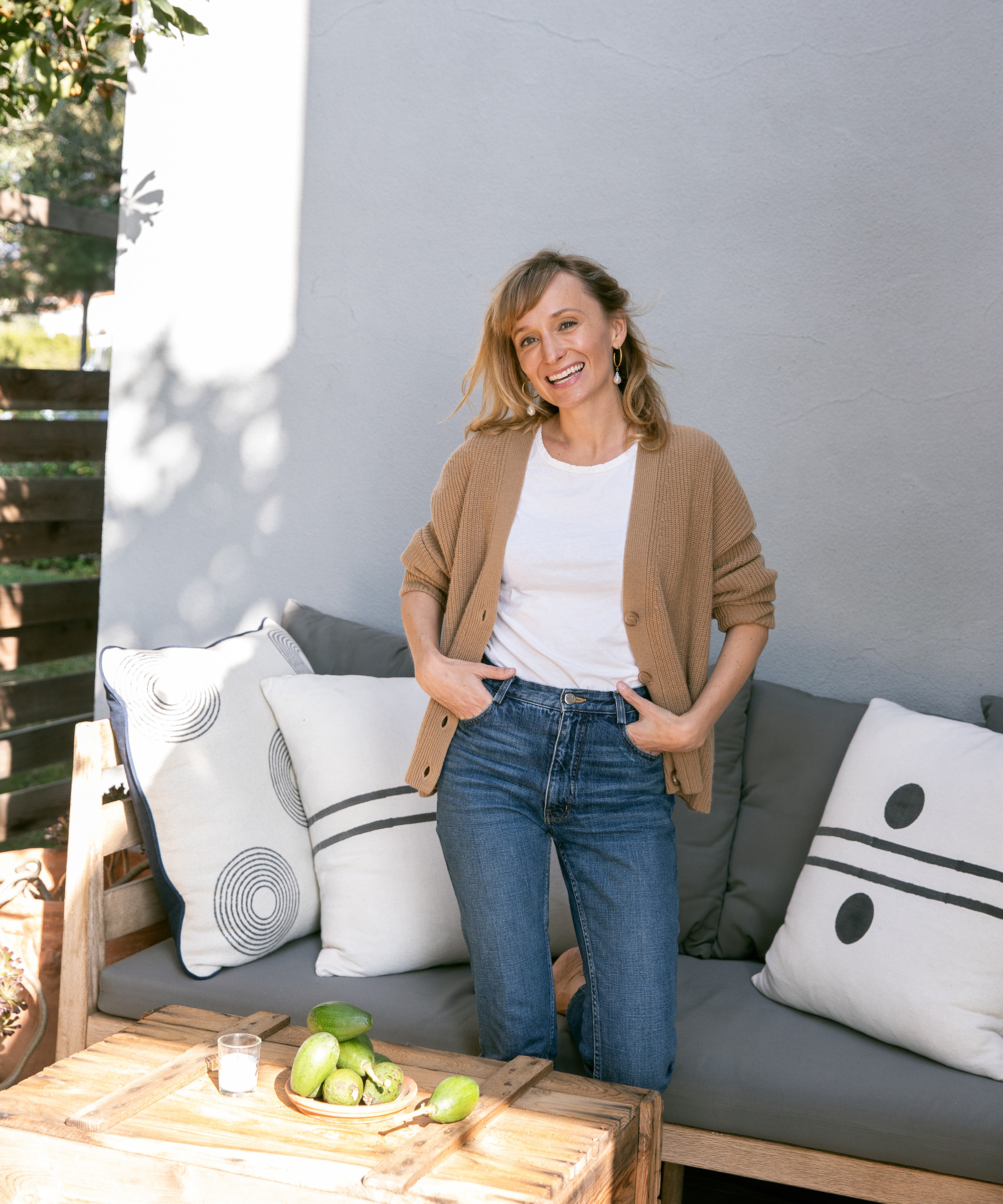 image of hopie stockman of block shop textiles standing wearing jenni kayne cropped cocoon cardigan
