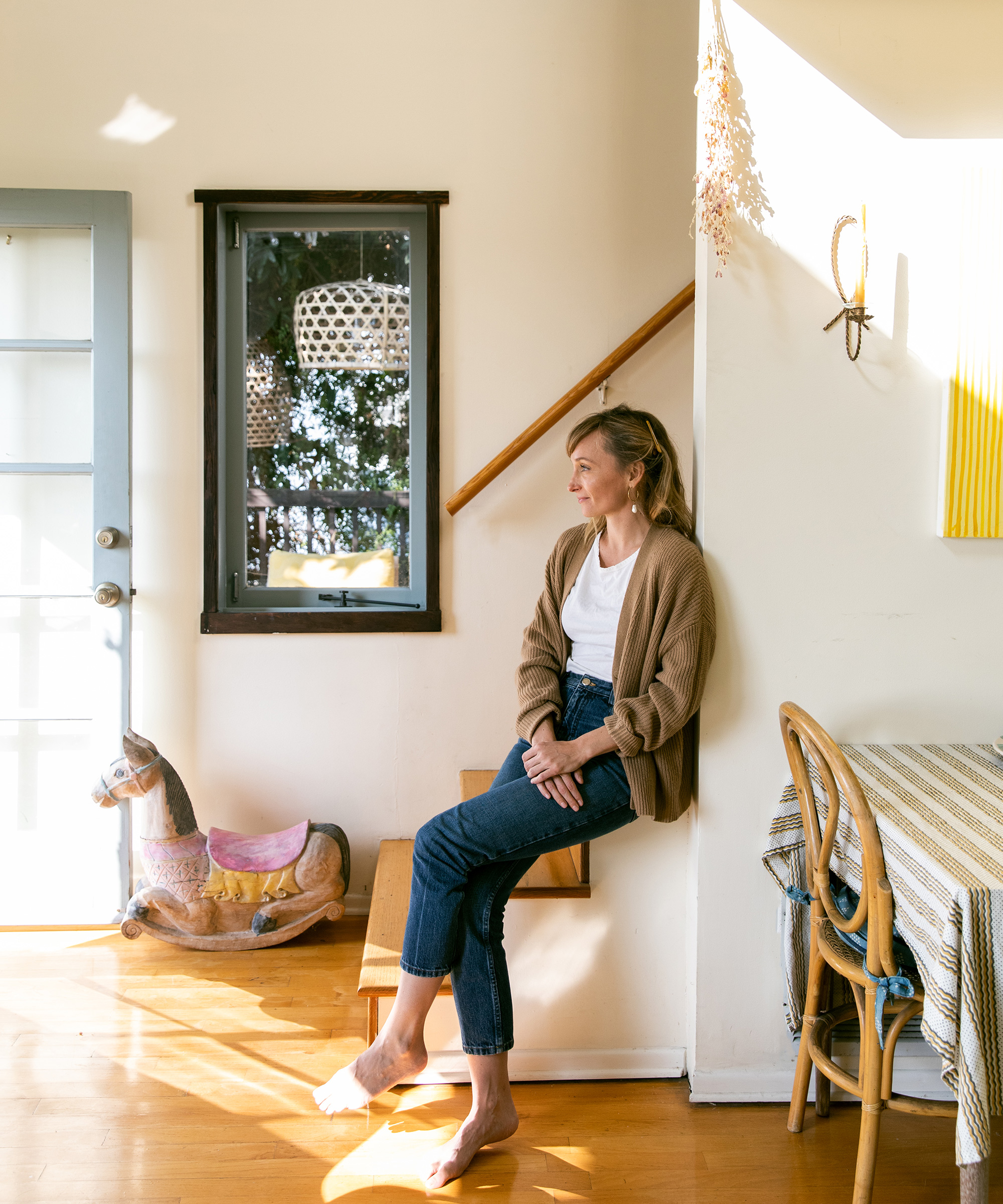 image of hopie stockman of block shop textiles standing wearing jenni kayne cropped cocoon cardigan