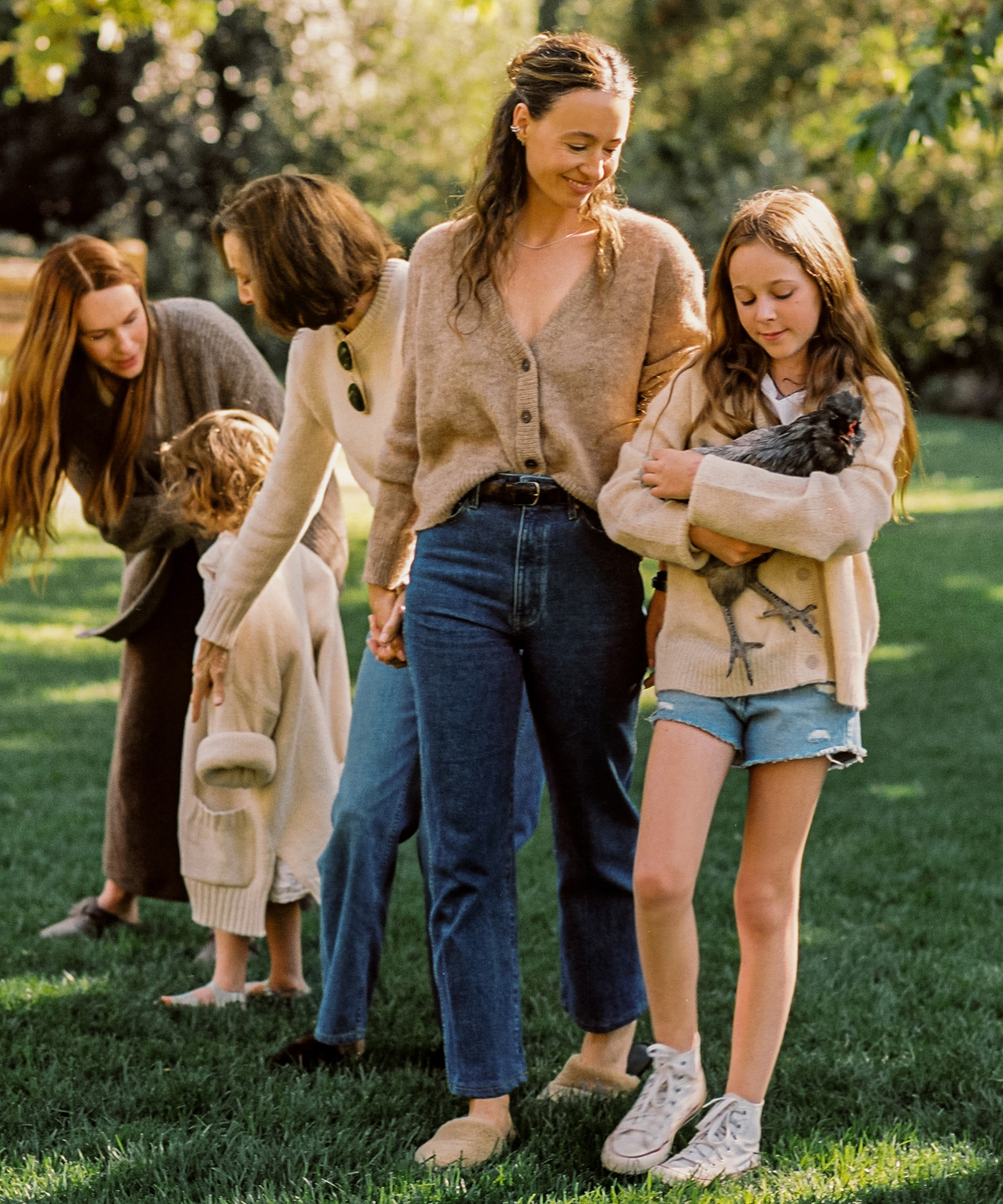 image of jenni kayne wearing a sweater with her daughter