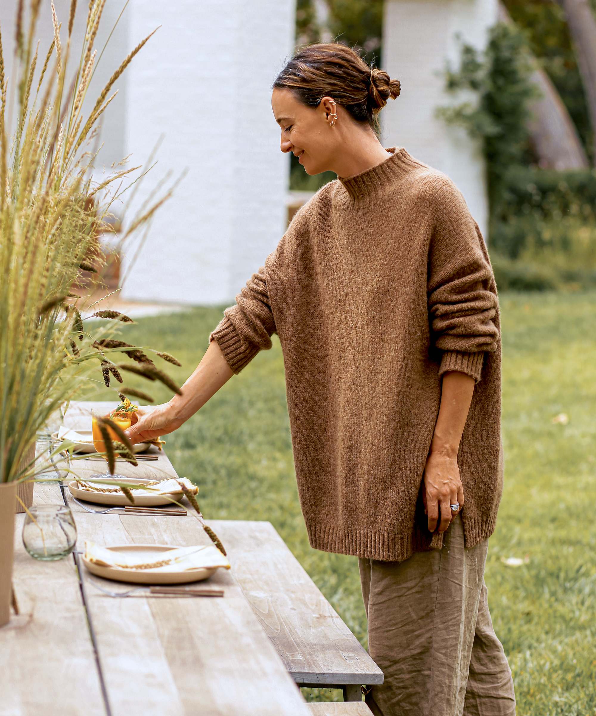 image of jenni kayne setting the table for a fall gathering