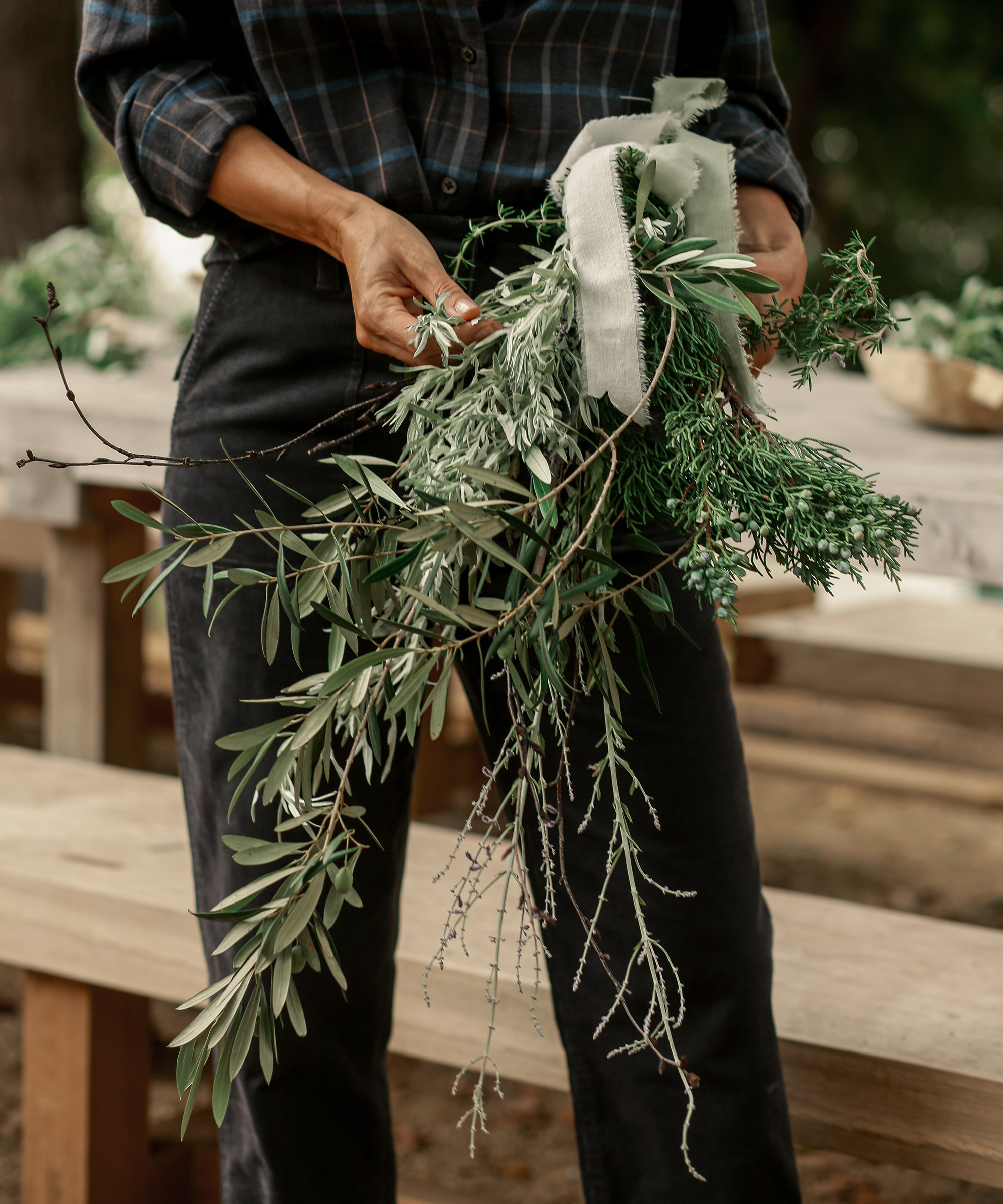 image of jenni holding a holiday swag