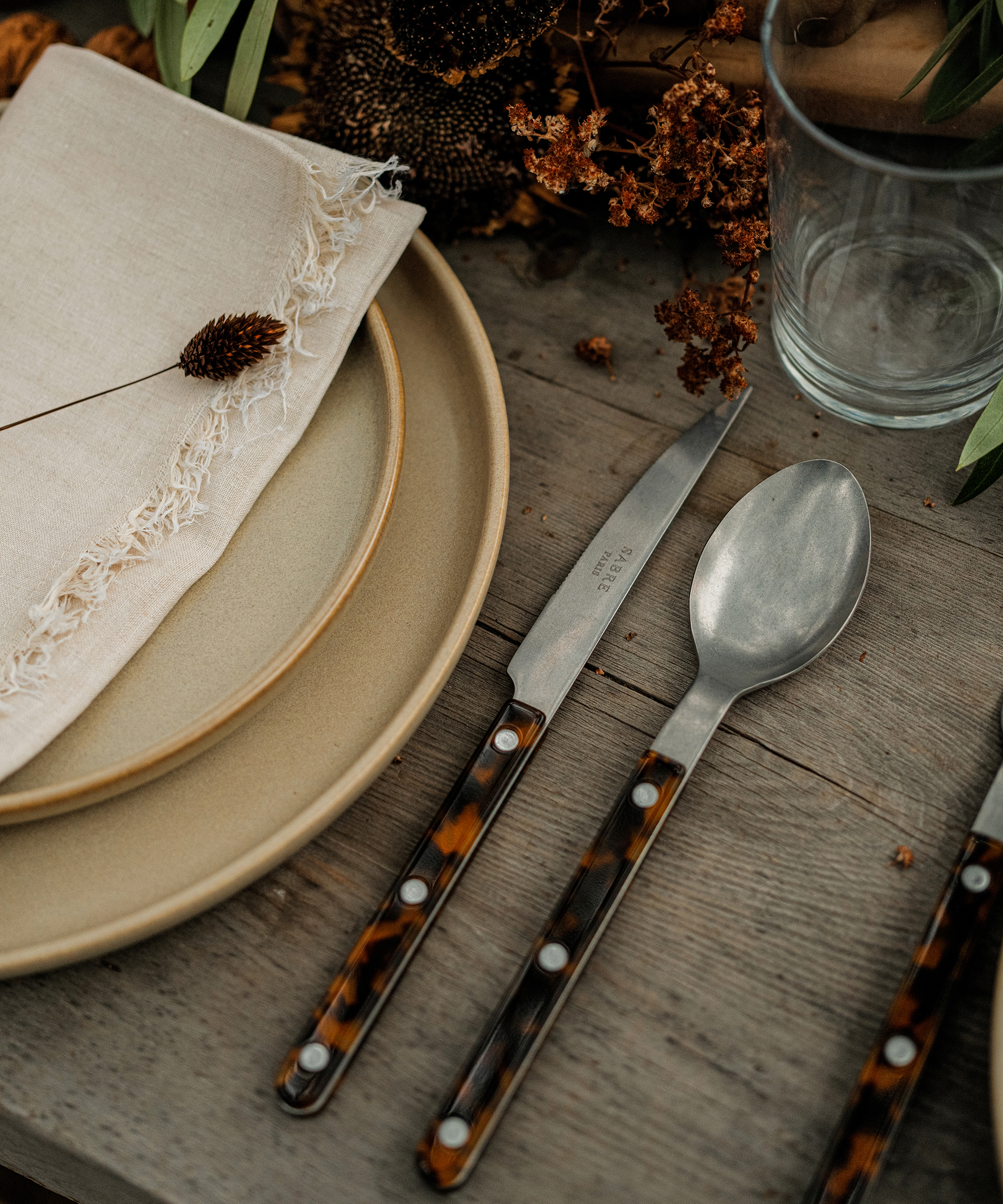 jenni kayne outdoor table setting with bistro cutlery