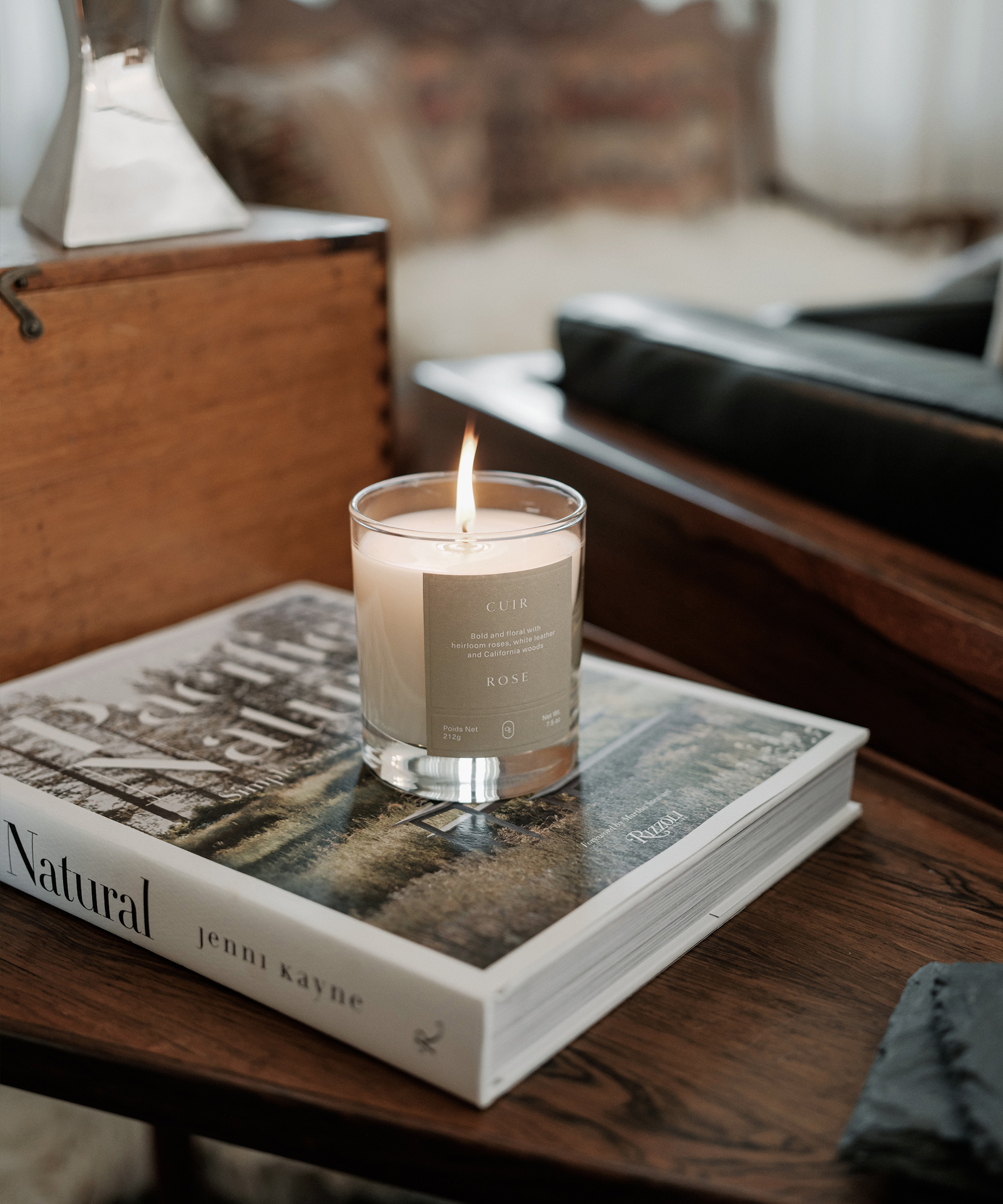 jenni kayne cuir candle on pacific natural coffee table book