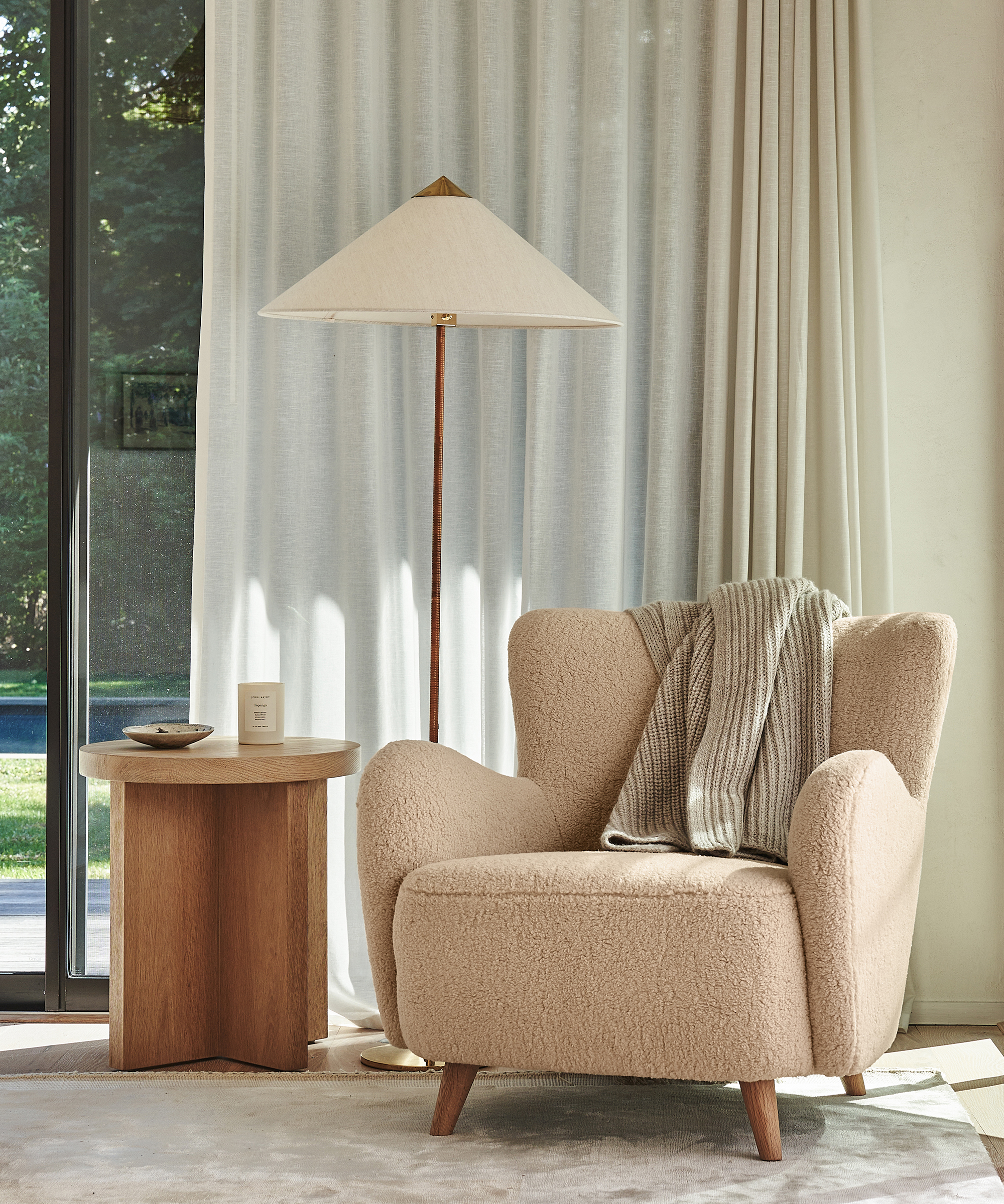 image of aspen boucle chair with fisherman throw in living room