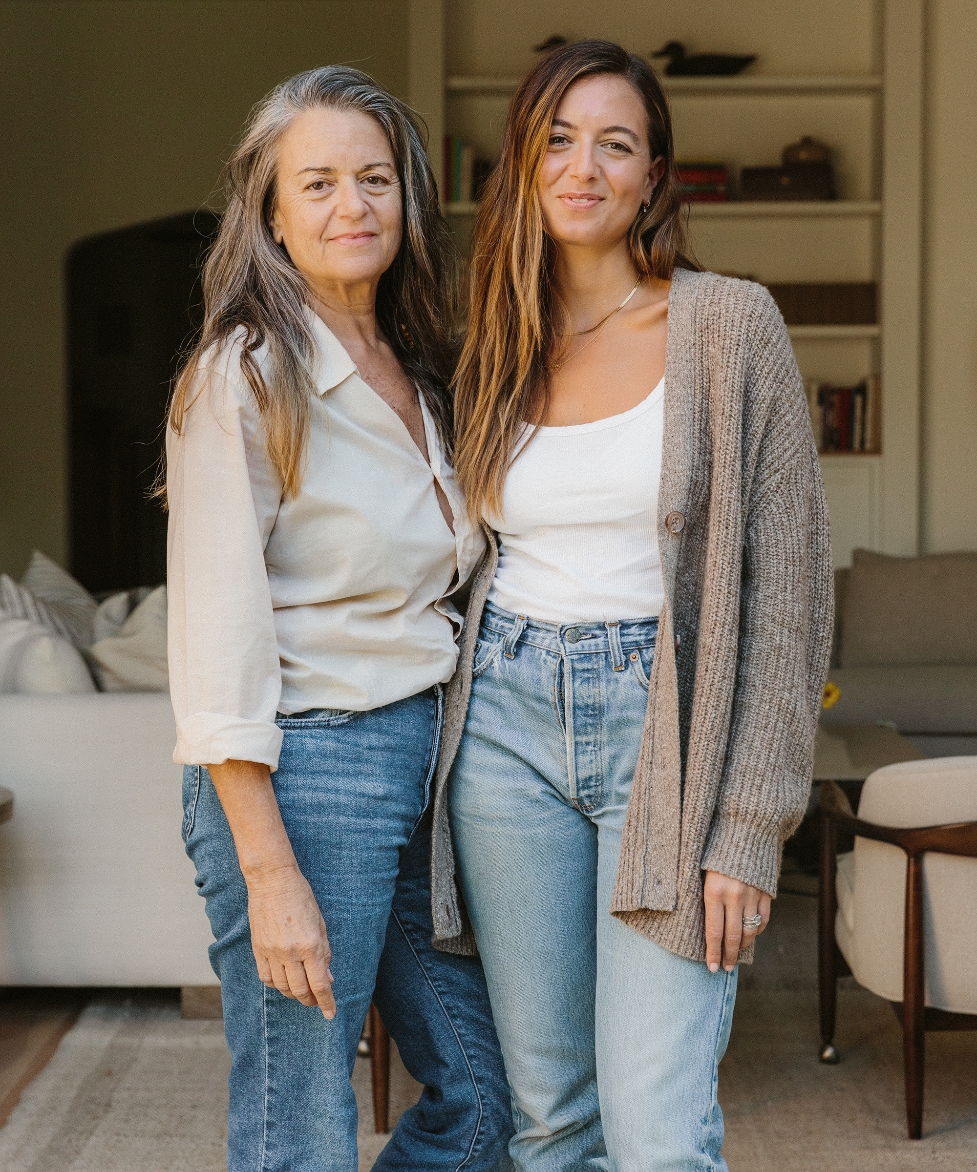 dorianne and mom duo portrait in front of family room