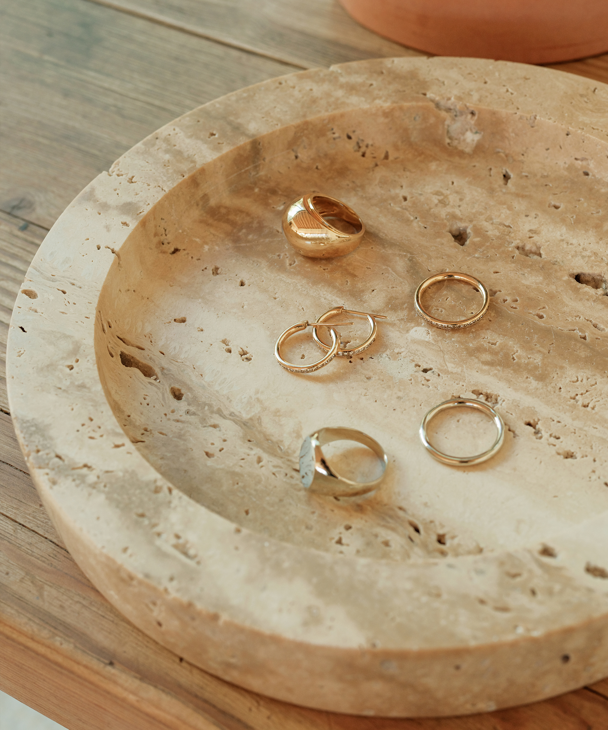 marble tray with gold and silver jewelry