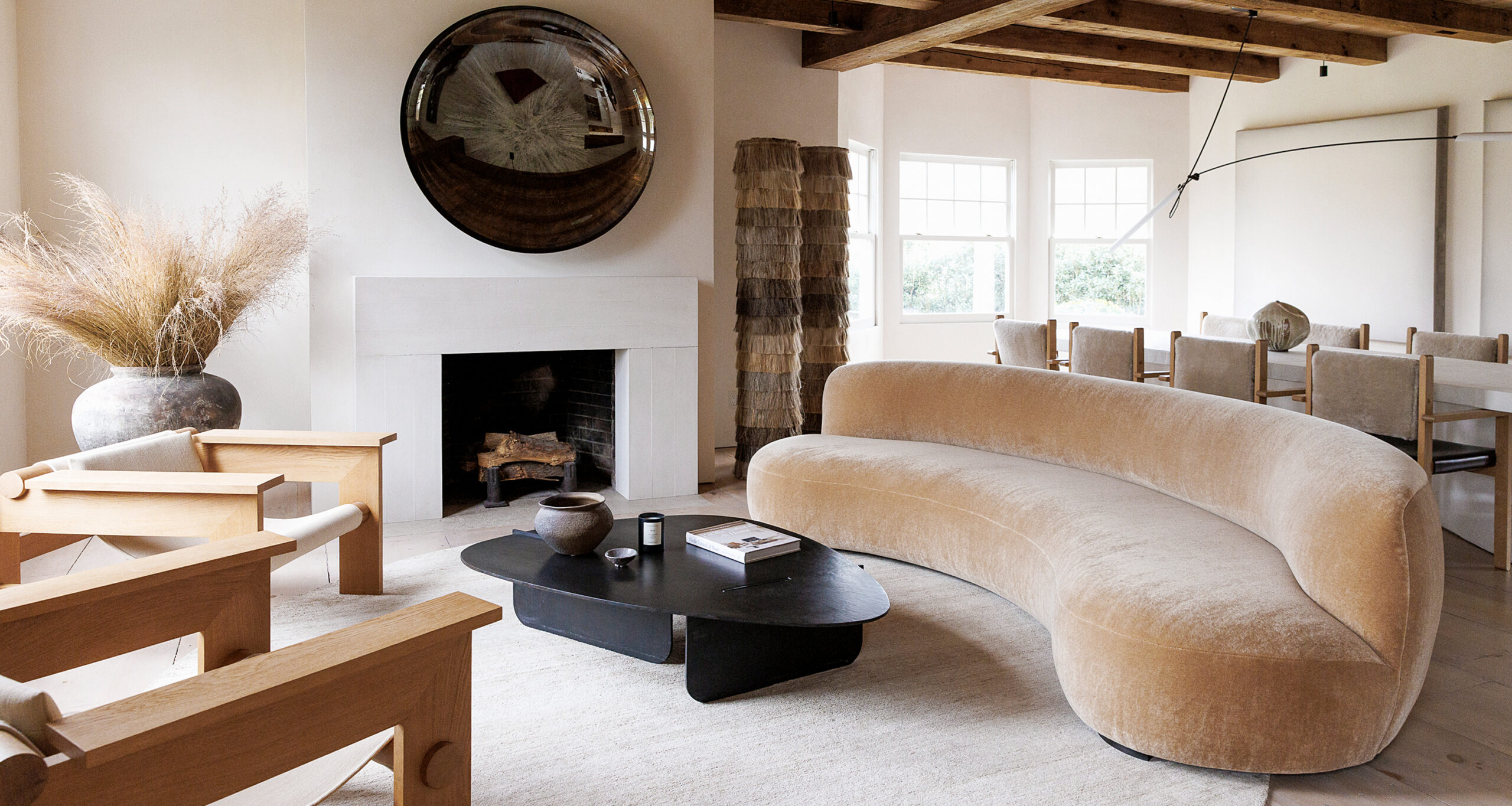 carlyle-designs-home-tour-cruved-couch-living-room-dining-room