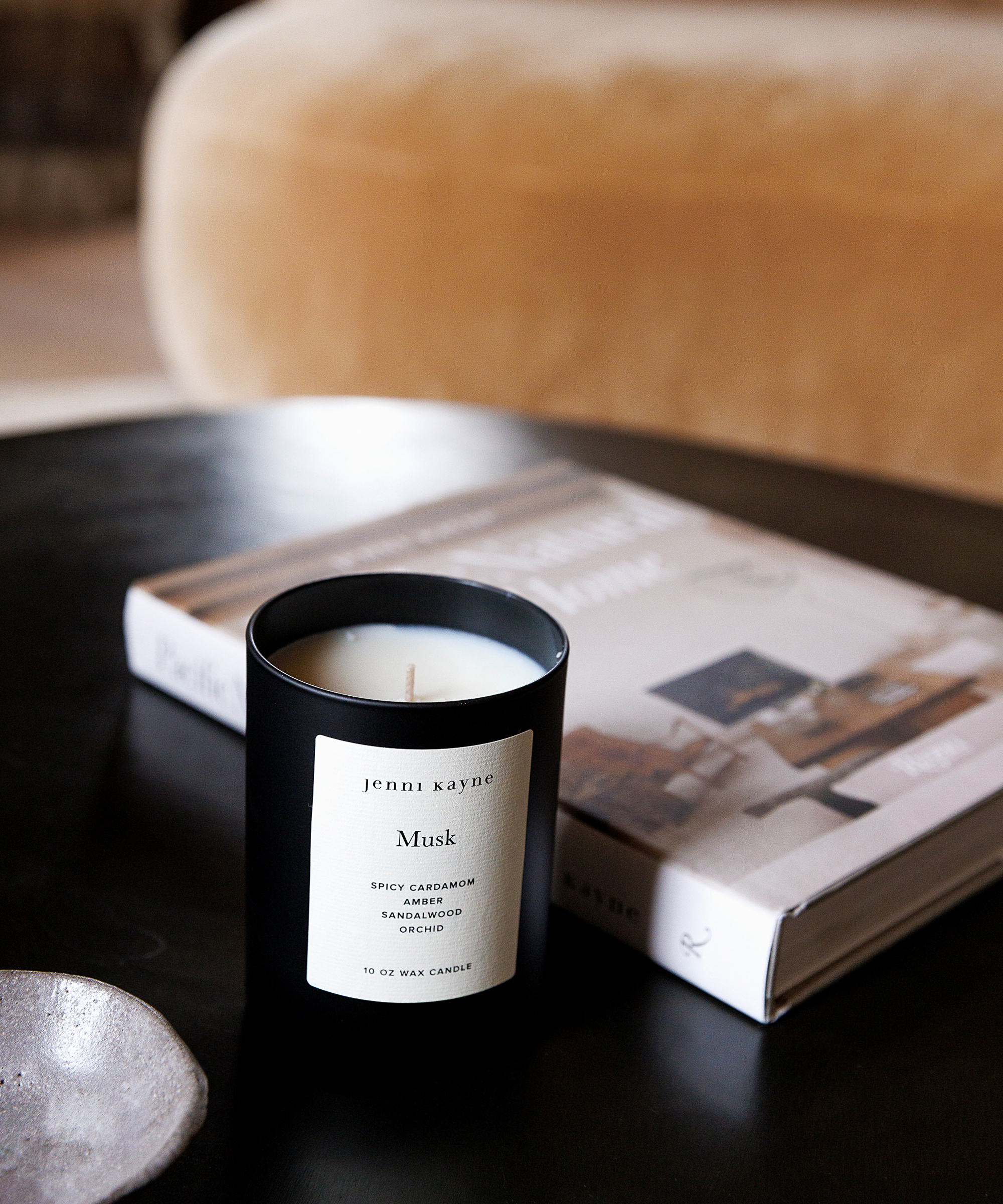 musk candle on a coffee table