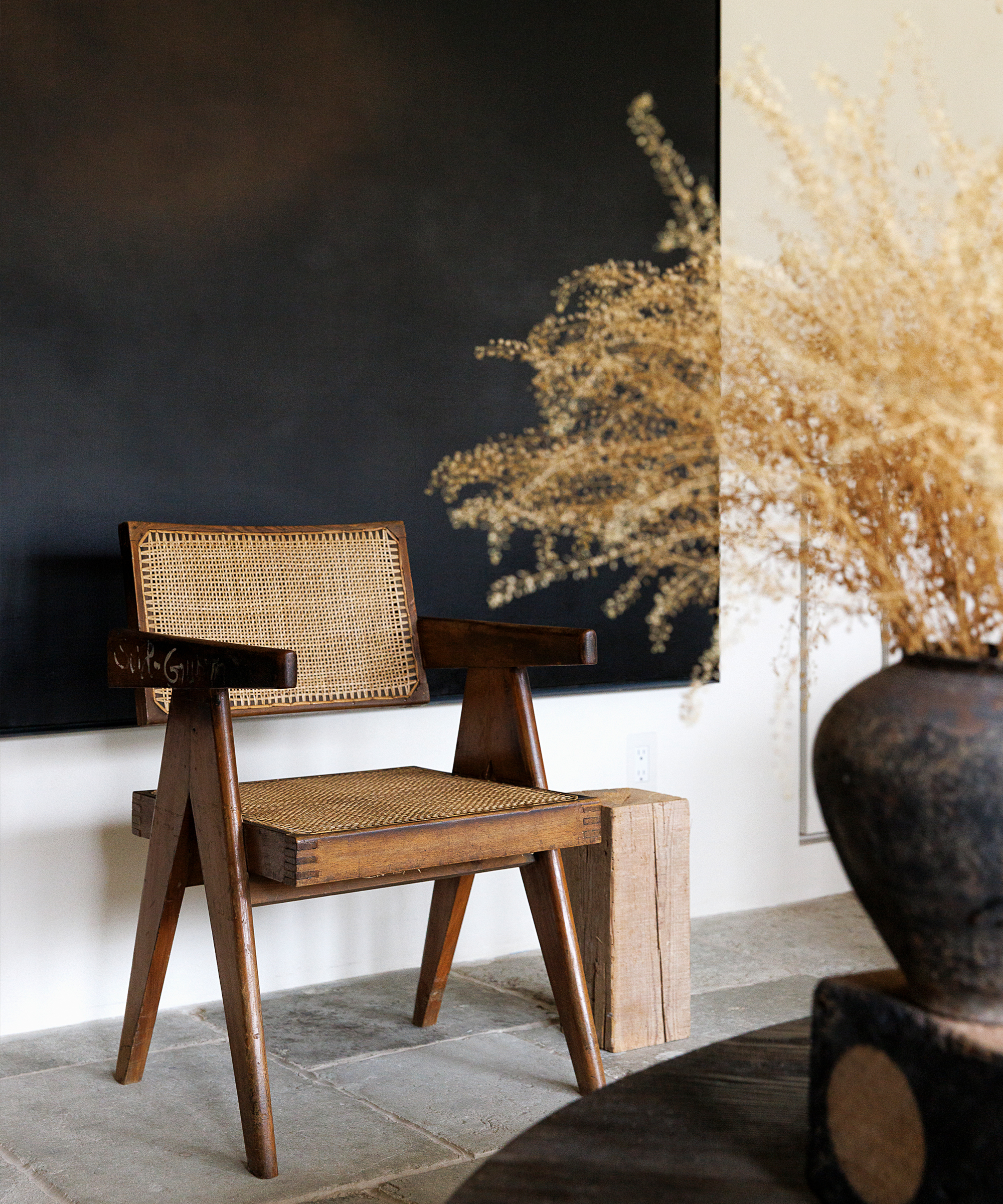 carlyle-designs-home-tour-wooden-accent-chair-black-wall-art