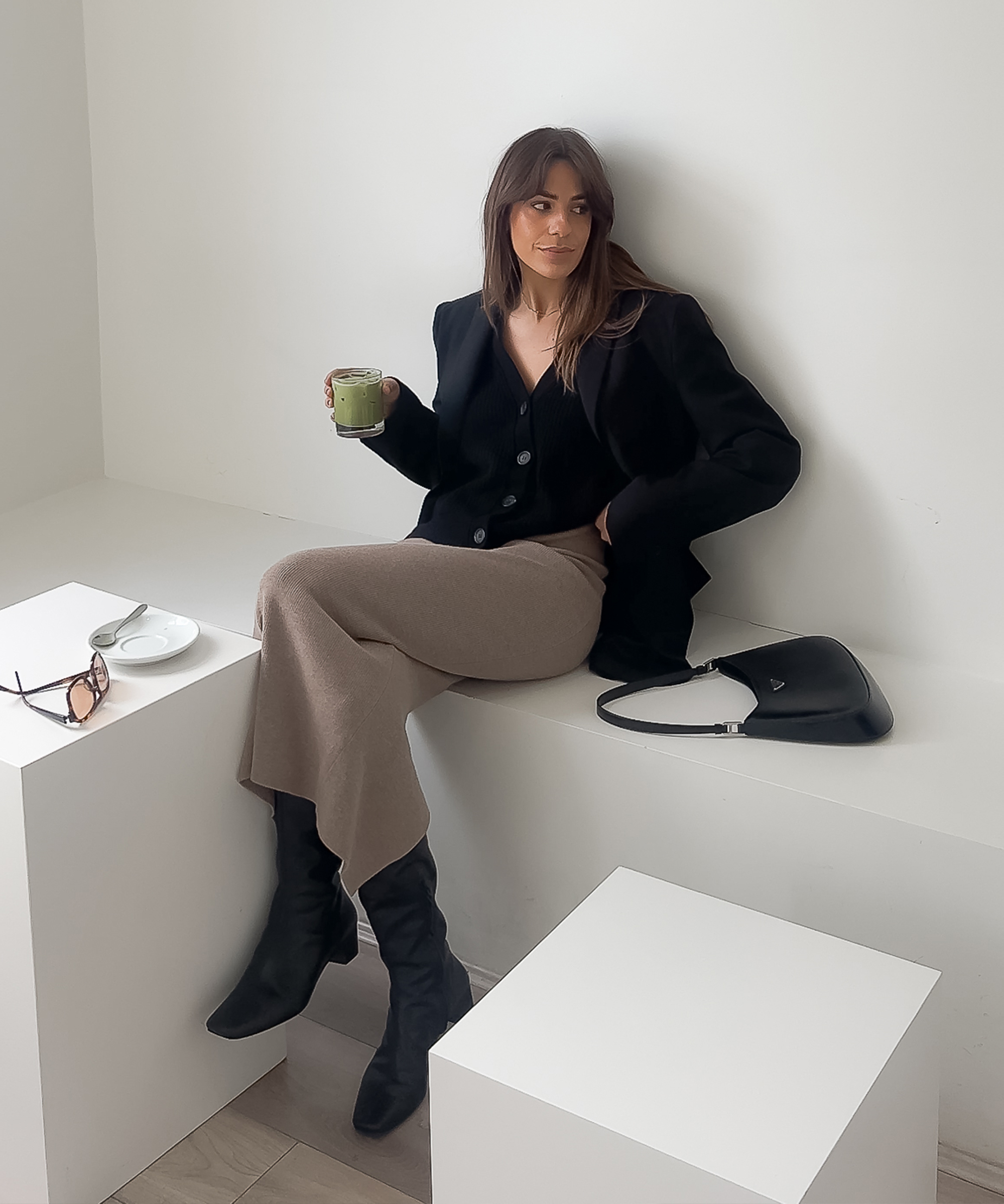 in-uniform-ash-grats-sitting-cafe-ludlow-skirt