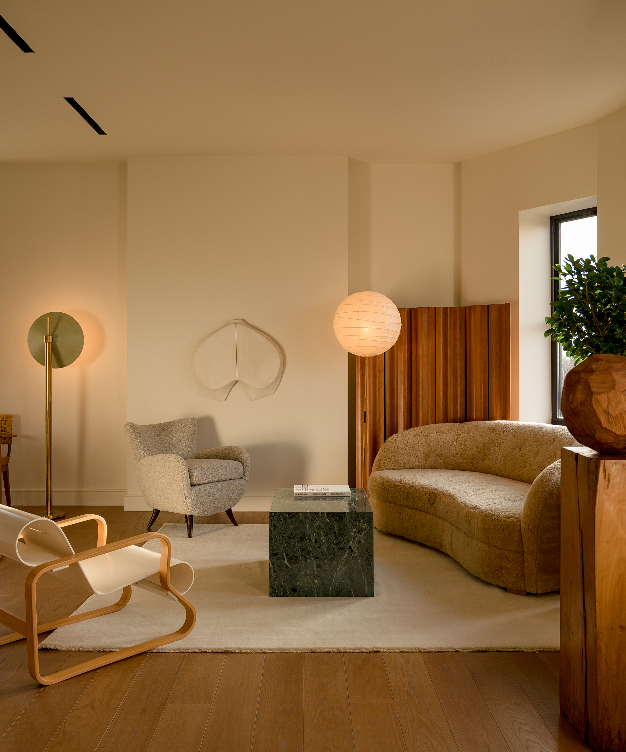 selma-akkari-home-tour-boucle-curved-living-room