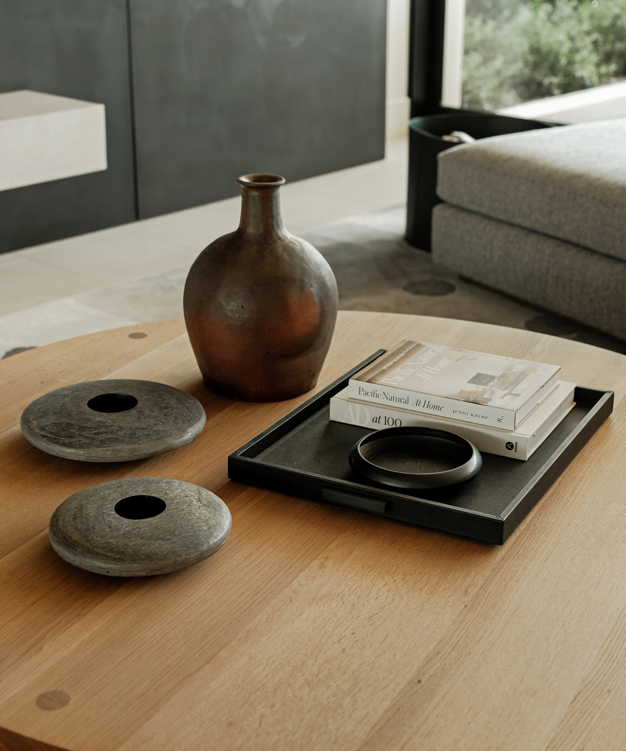 wooden coffee table with pacific natural at home coffee table book and stone decorative accessories
