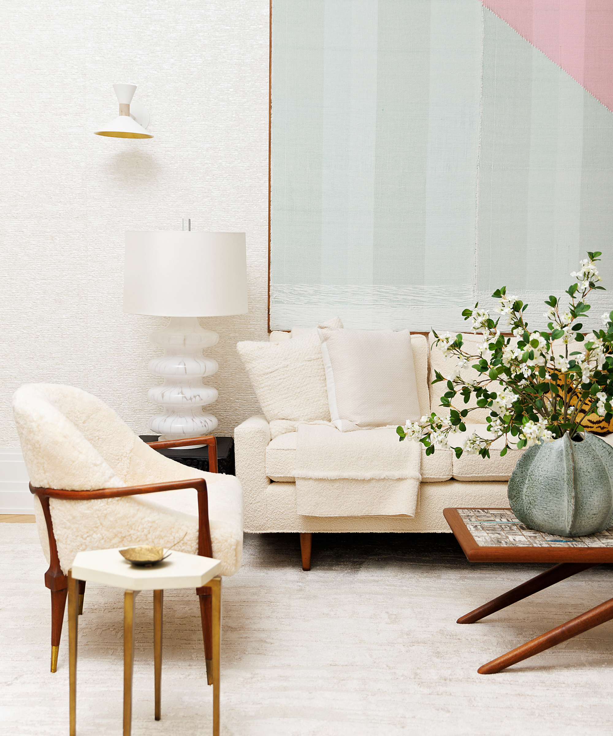 ashley-stark-home-tour-white-living-room-light-teal-large-wall-art