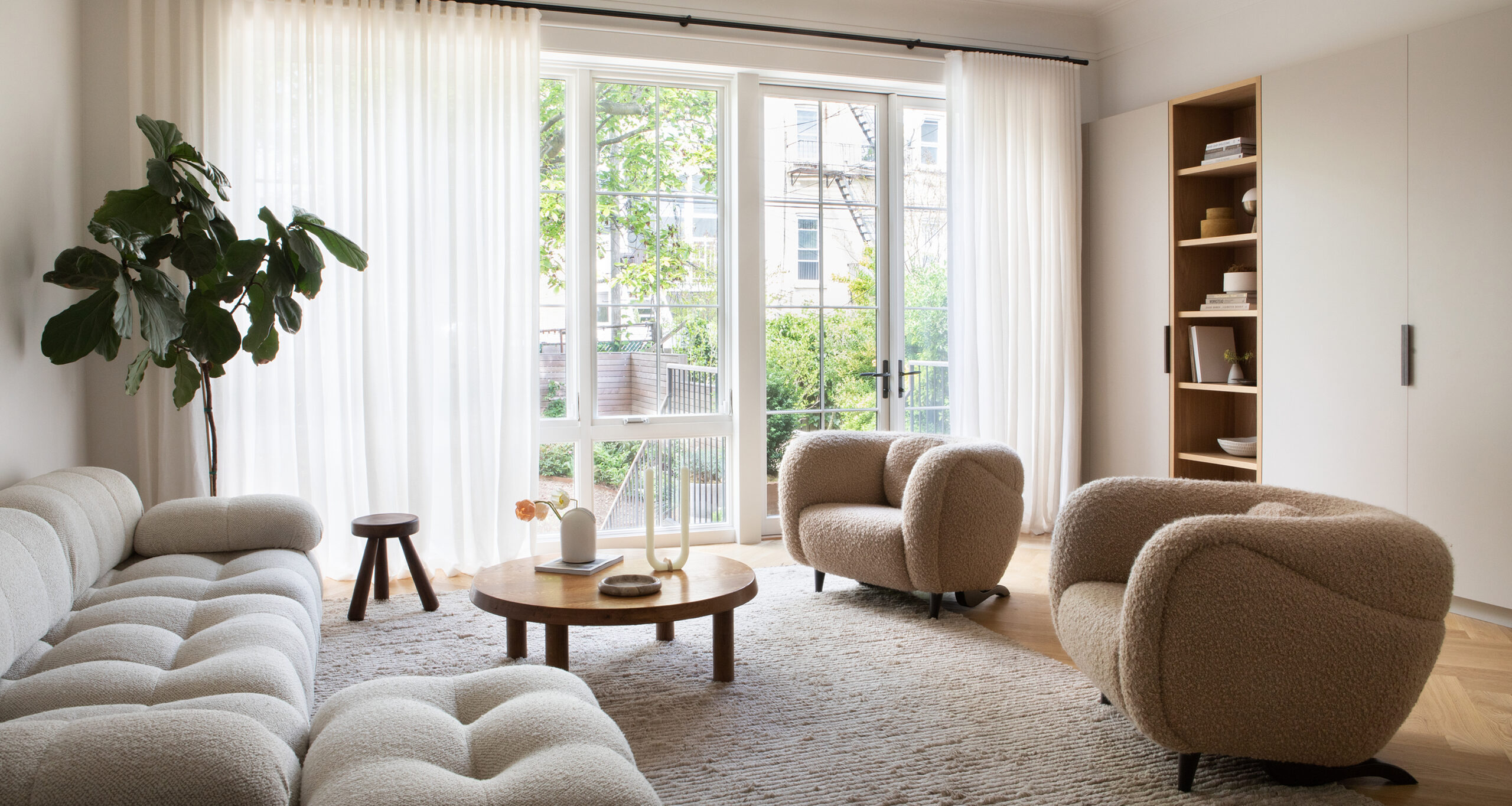 nune-home-tour-living-room-sectional-coffee-table-accent-chairs