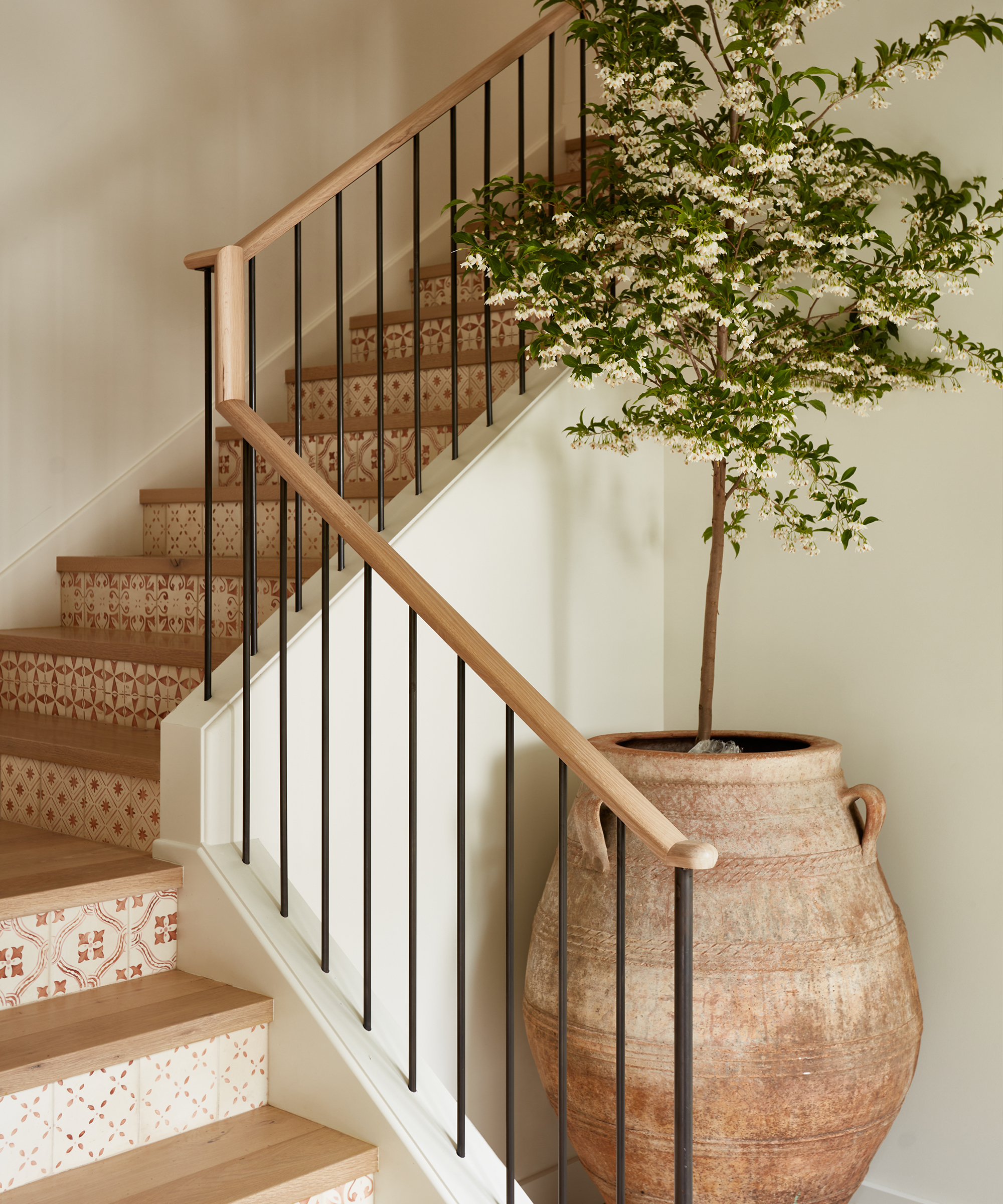 lisa-stanton-home-tour-stairwell-potted-plant