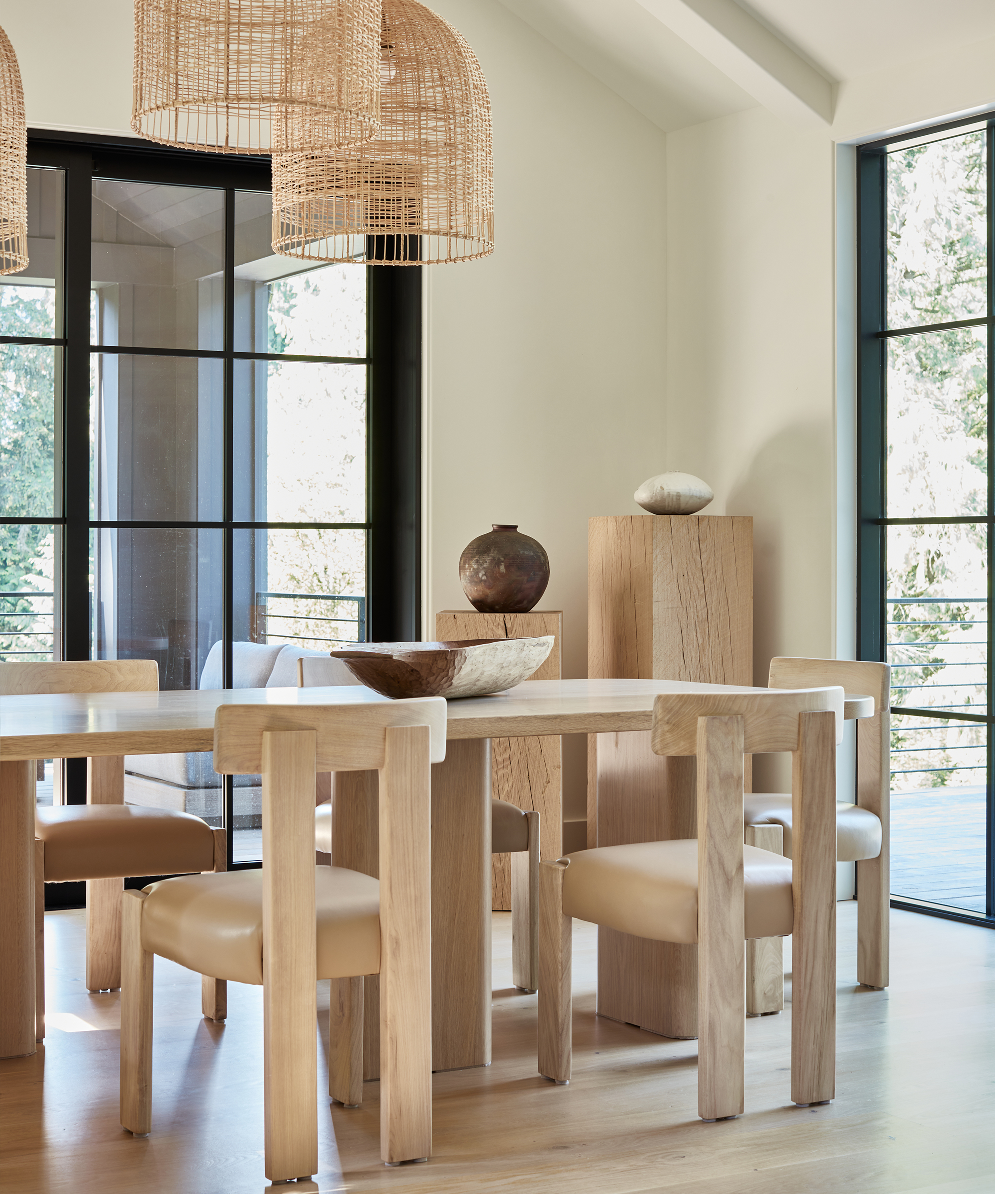 lisa-staton-home-tour-oak-dining-table-oak-and-leather-dining-chairs-rattan-chandelier