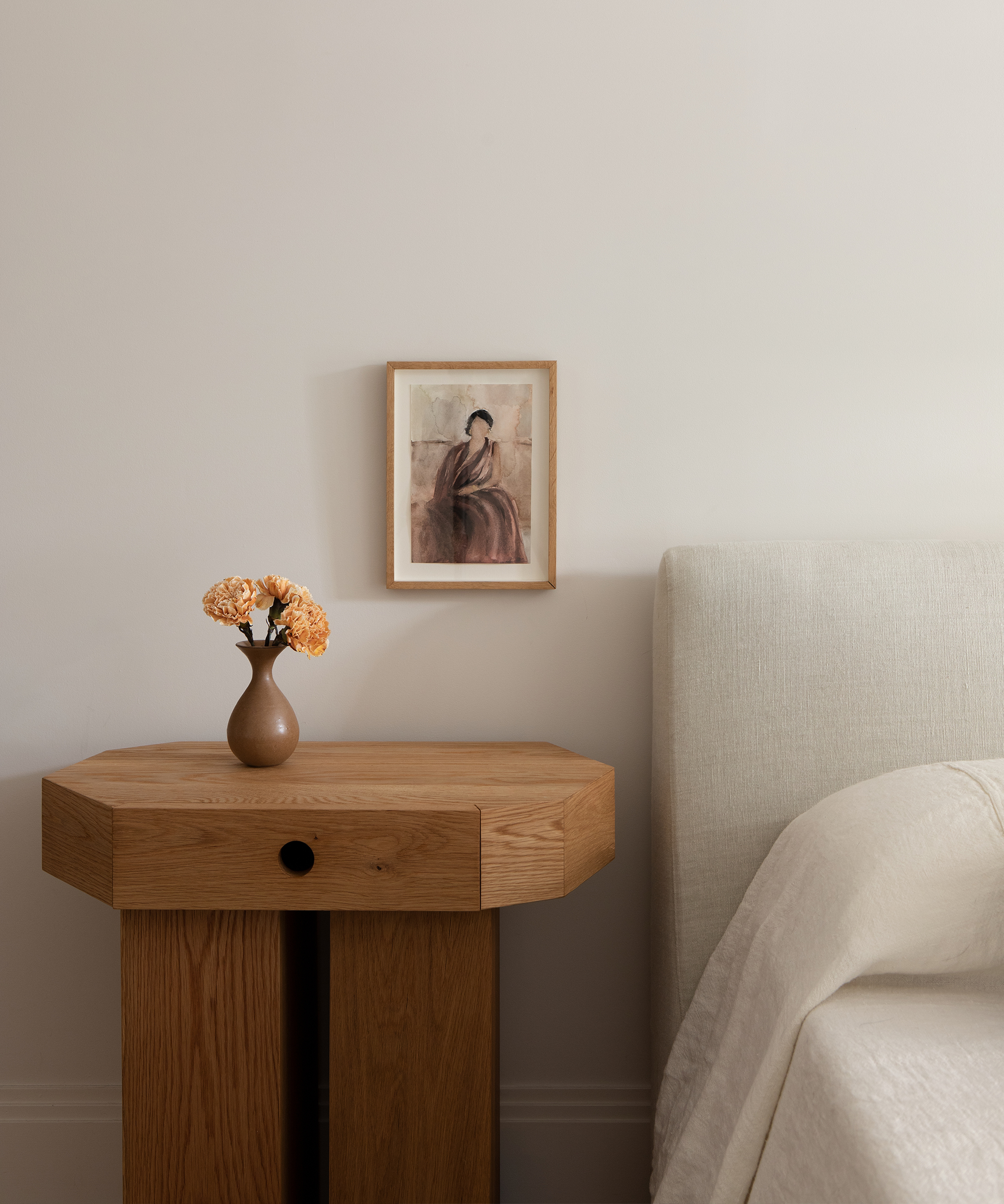 nune-home-tour-wood-nightstand-bedroom