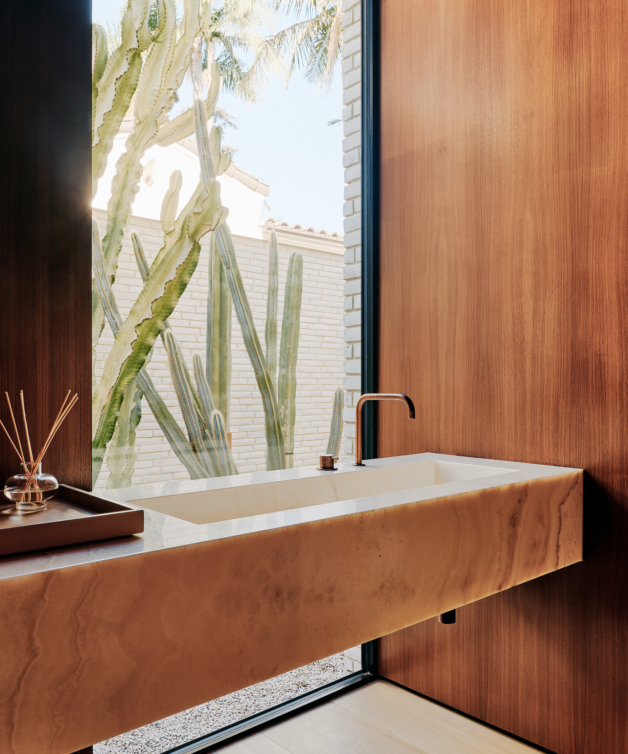 woods-dangaran-home-tour-marble-sink-cactus-bathroom