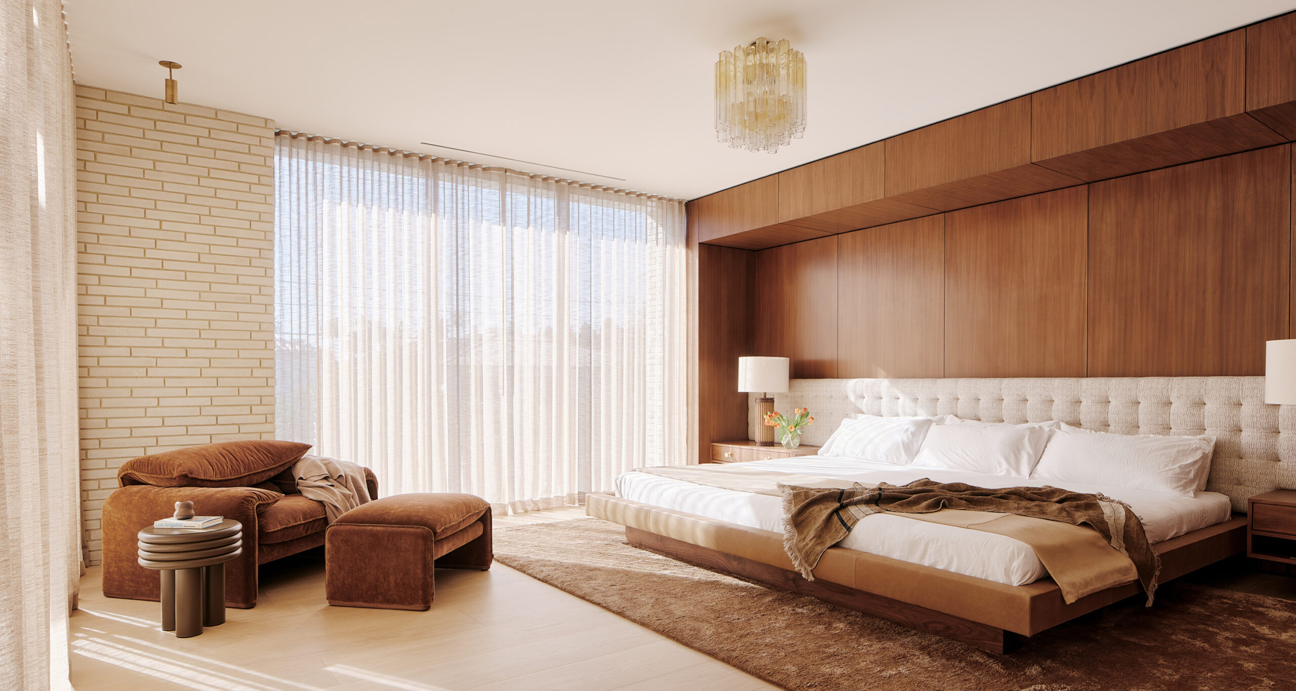 woods-dangaran-home-tour-primary-bedroom-brown-accent-chair
