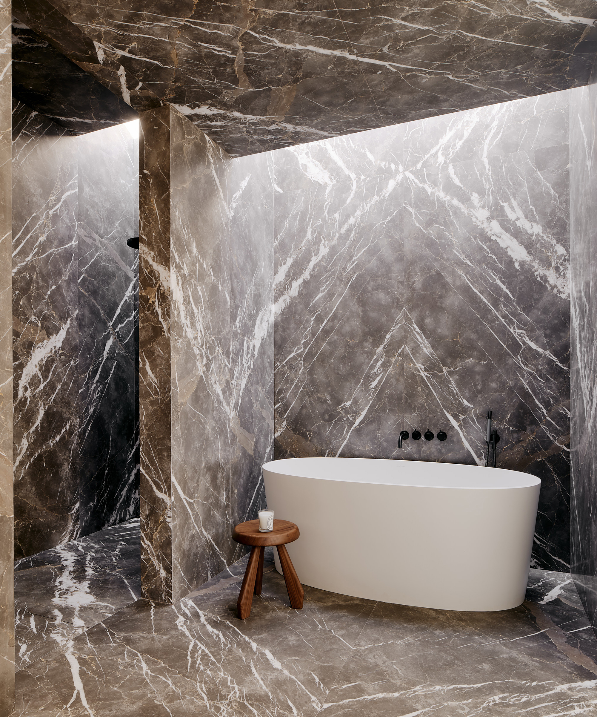 woods-dangaran-home-tour-grey-marble-primary-bathroom-white-soaking-tub