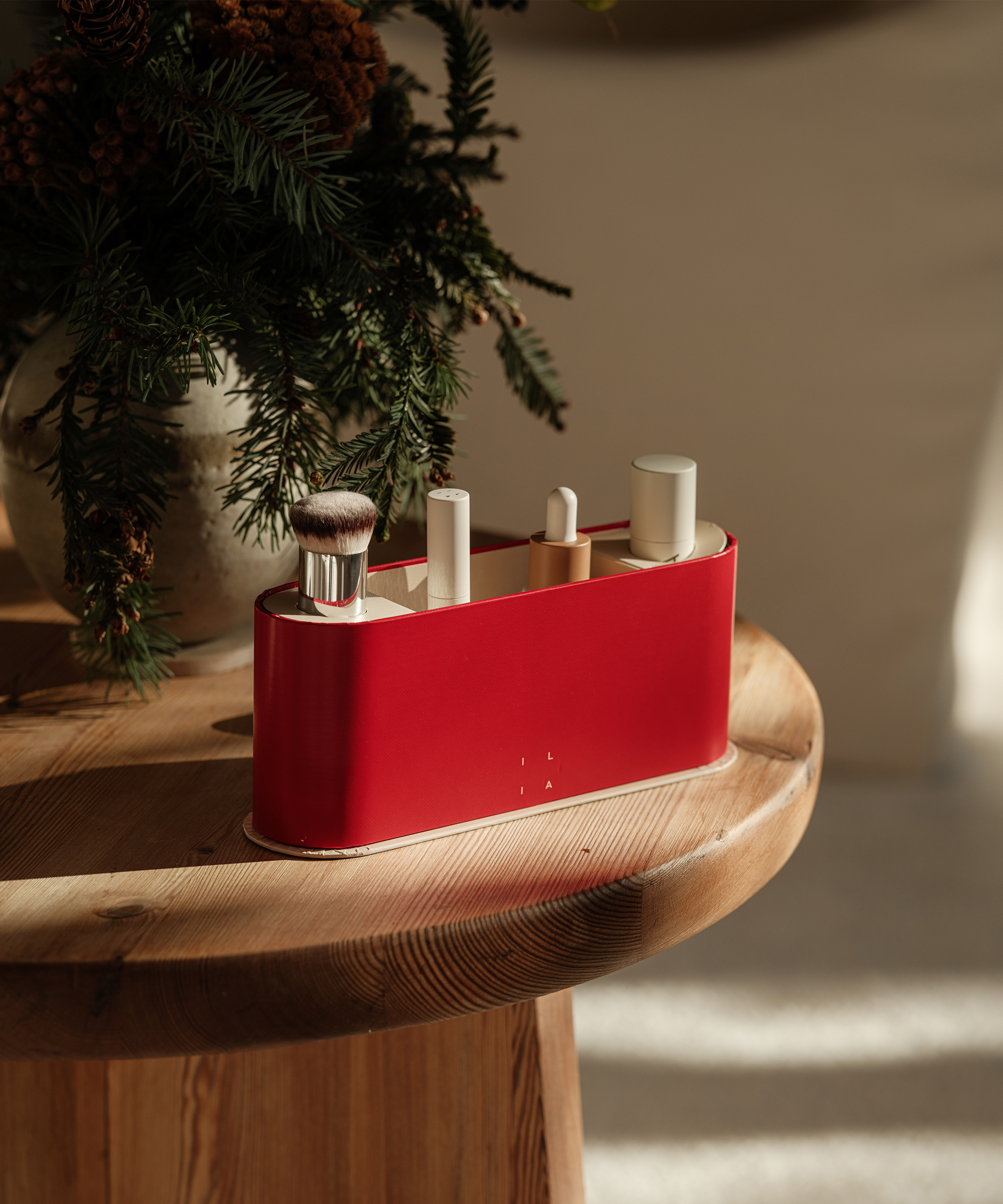 sasha-ilia-founder-makeup-kit-side-table