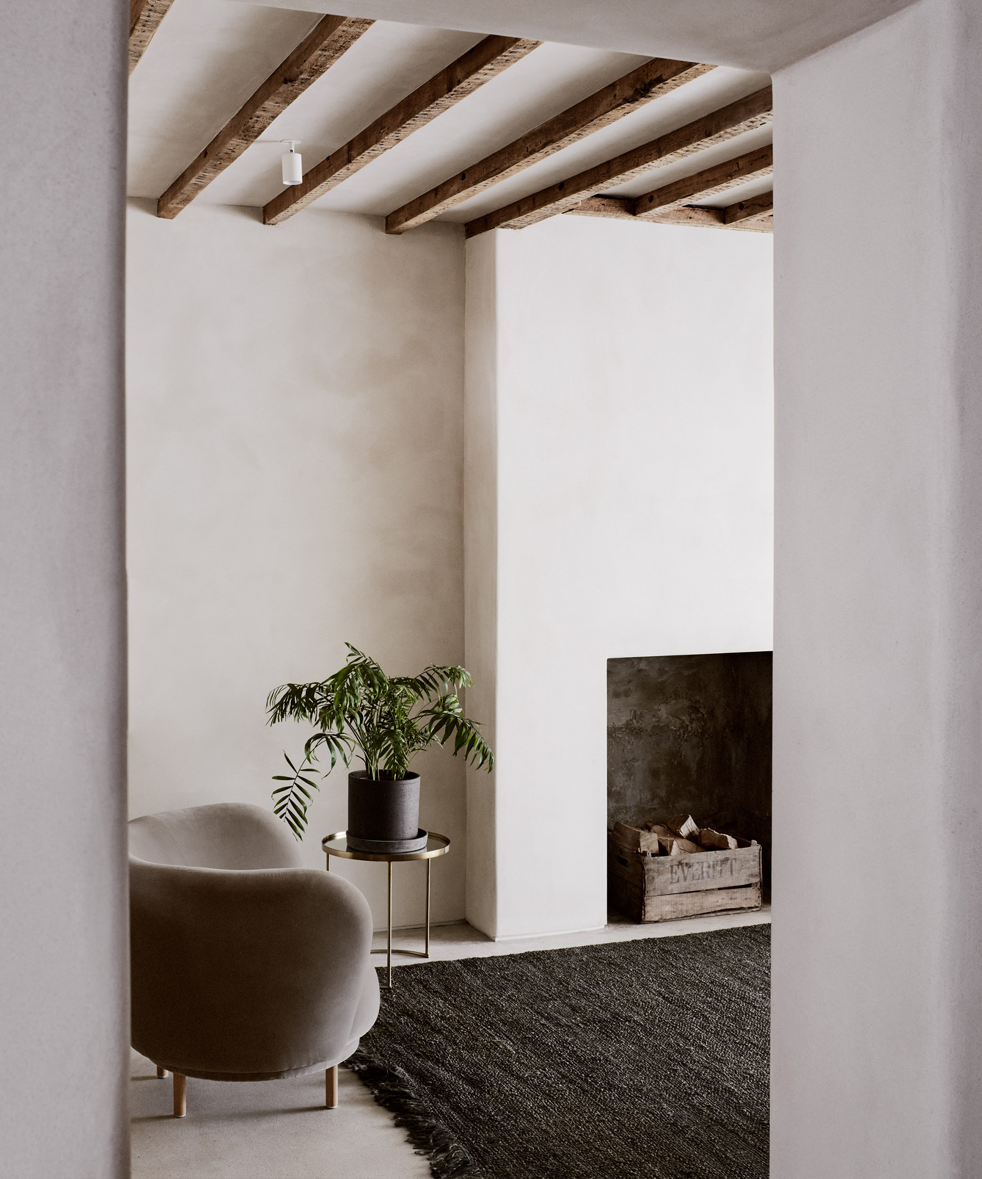 house-of-grey-home-tour-accent-chair-fireplace