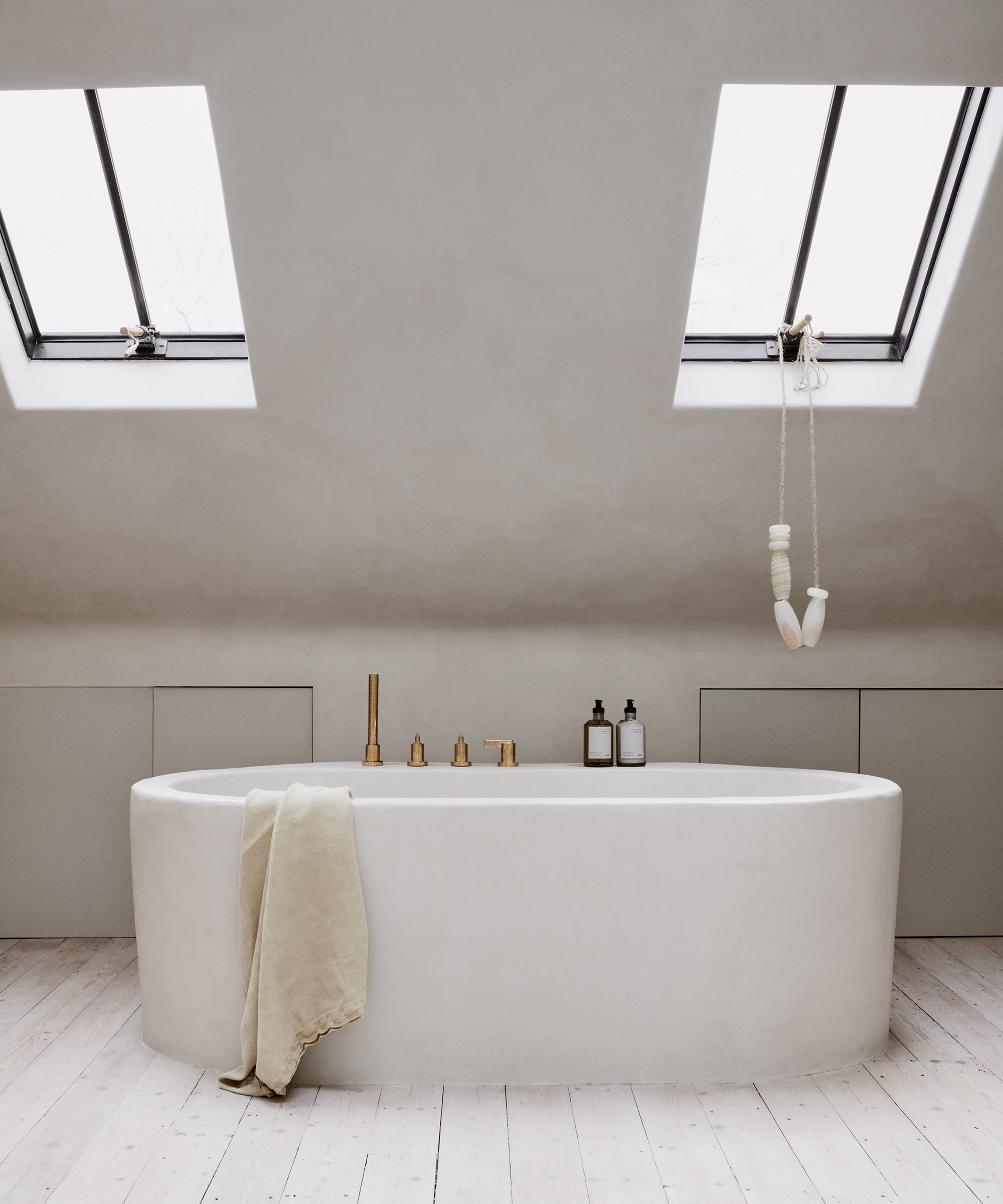 house-of-grey-home-tour-stone-standalone-tub