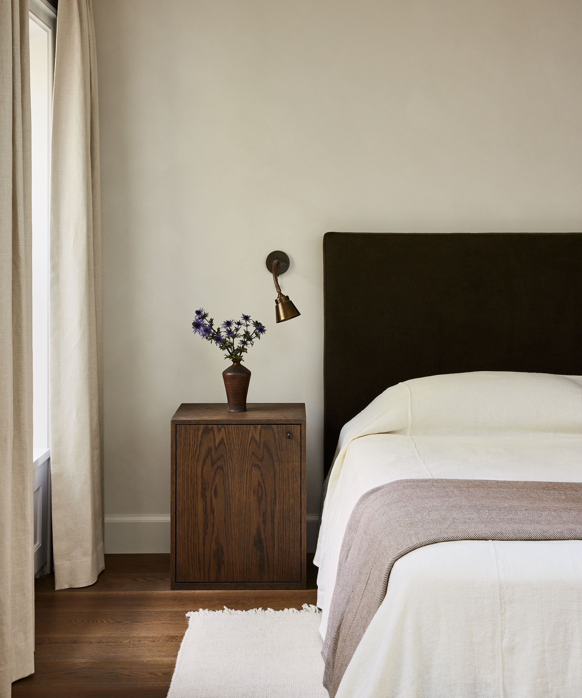 and-studio-home-tour-brown-headboard-ivory-bedding