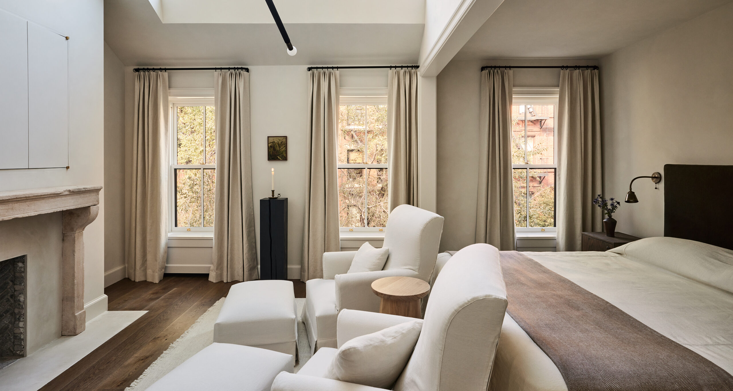 and-studio-home-tour-primary-master-suite-two-accent-chairs
