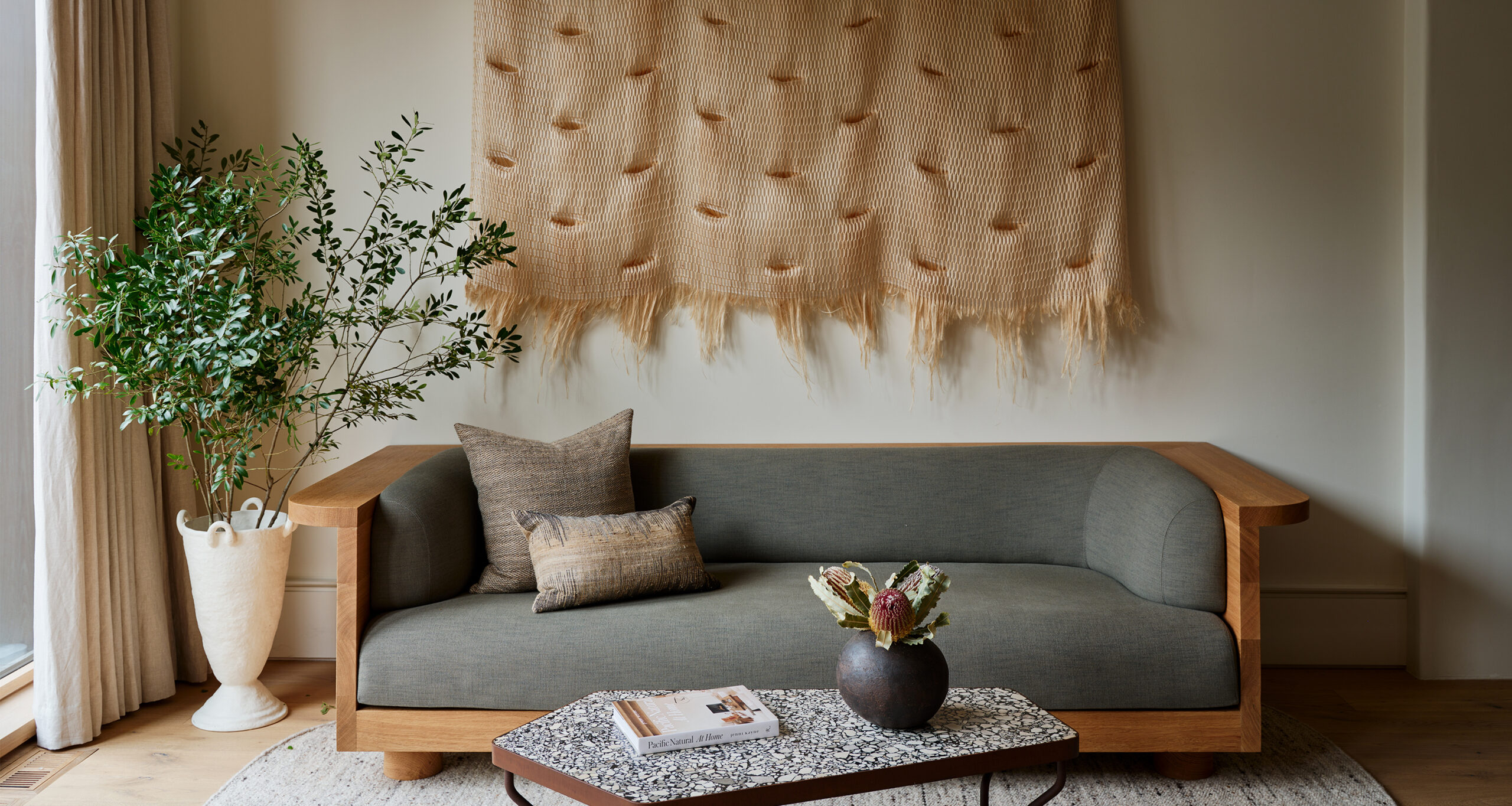 jessica-gersten-home-tour-family-room-wooden-couch