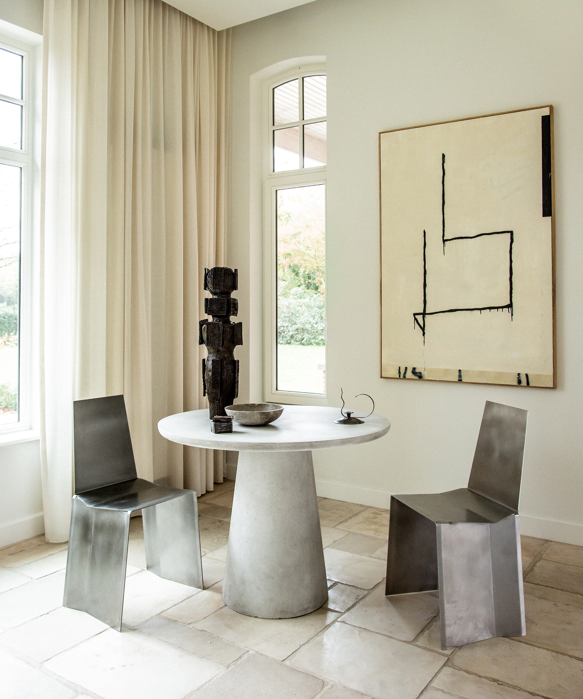 kate-davidson-home-tour-silver-accent-chairs-round-table