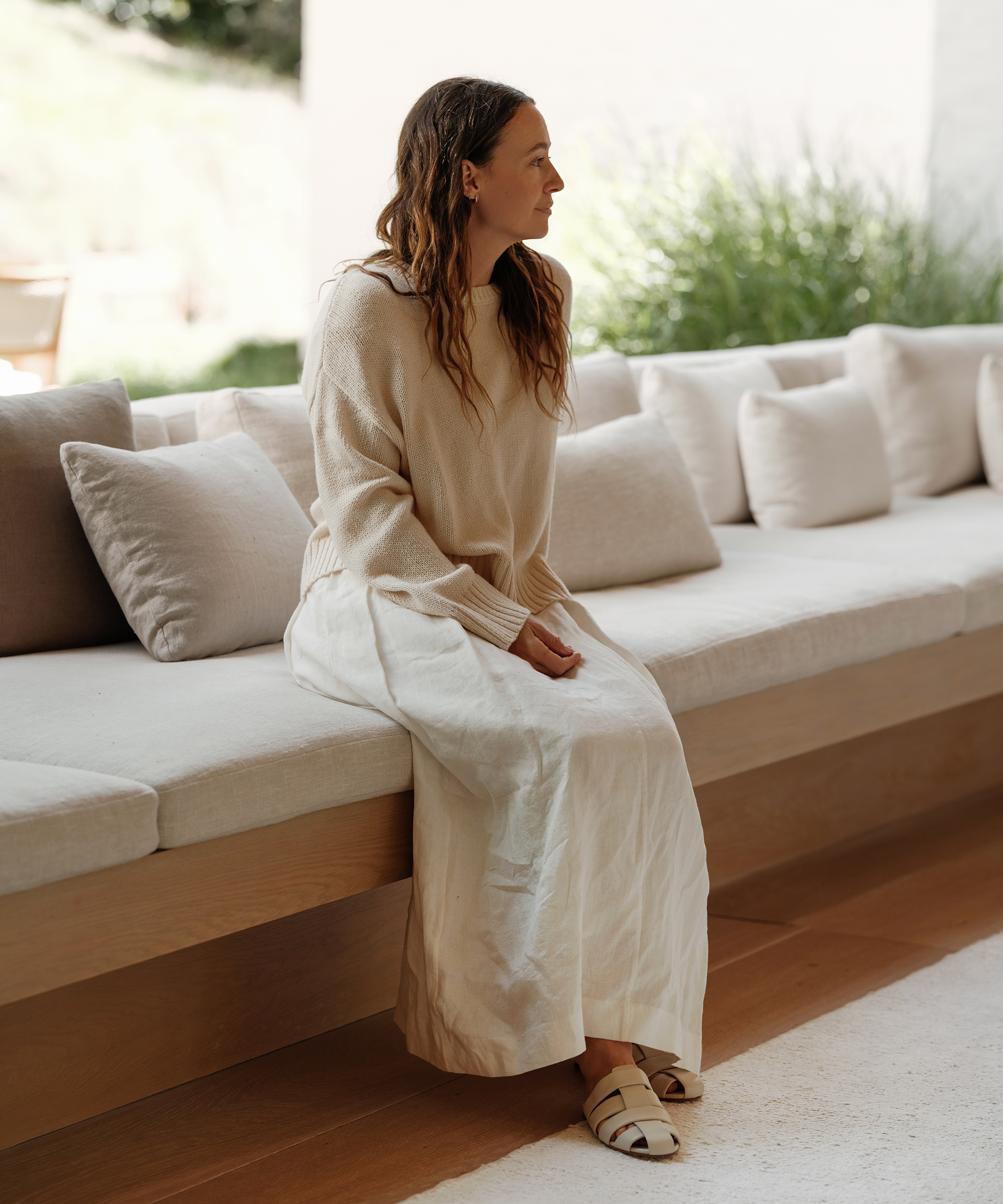 jenni-april-style-cameron-crewneck-annabel-skirt-sitting-couch