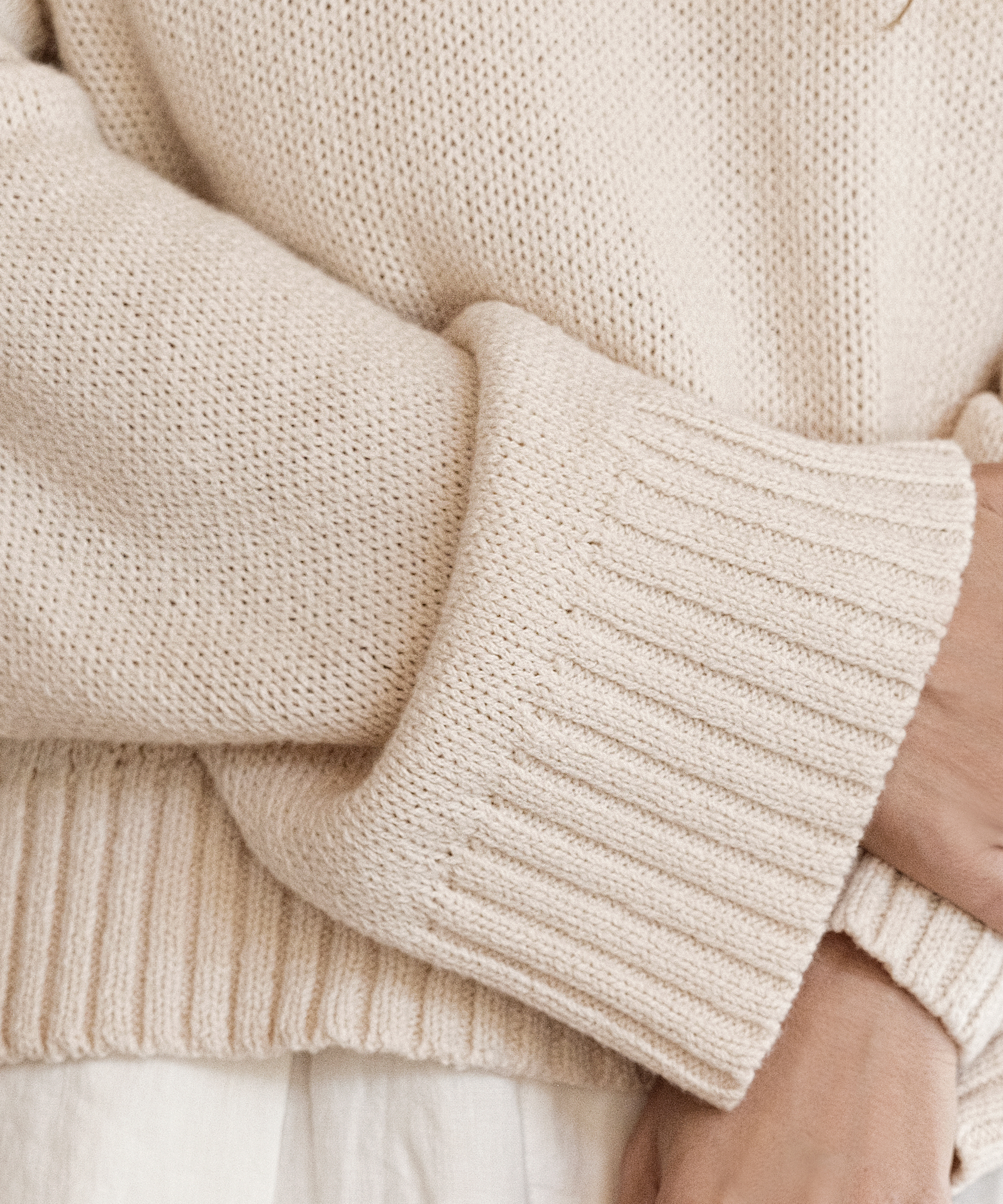 cameron crewneck in ivory up close detail photo