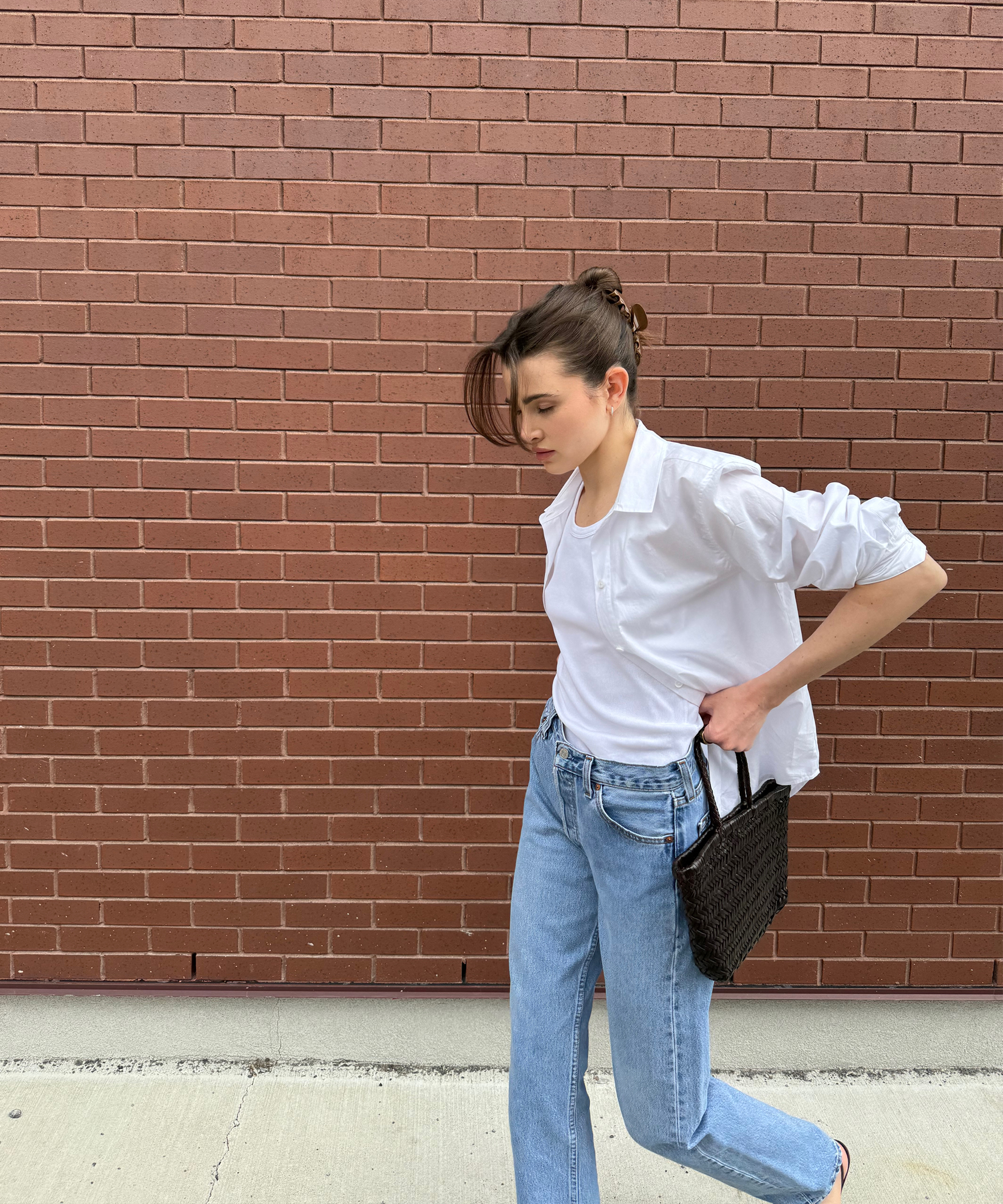 anna-porte-in-uniform-white-tank-white-button-up-blue-jeans