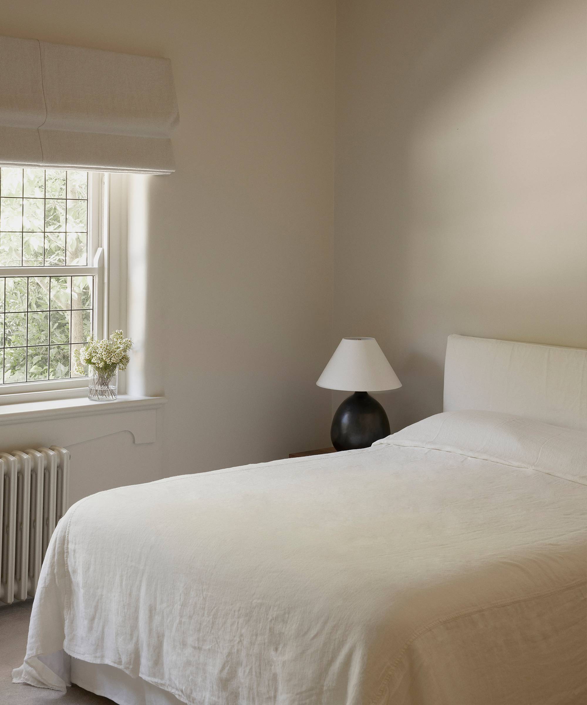 emily-gillis-home-tour-ivory-bedding-primary-bedroom