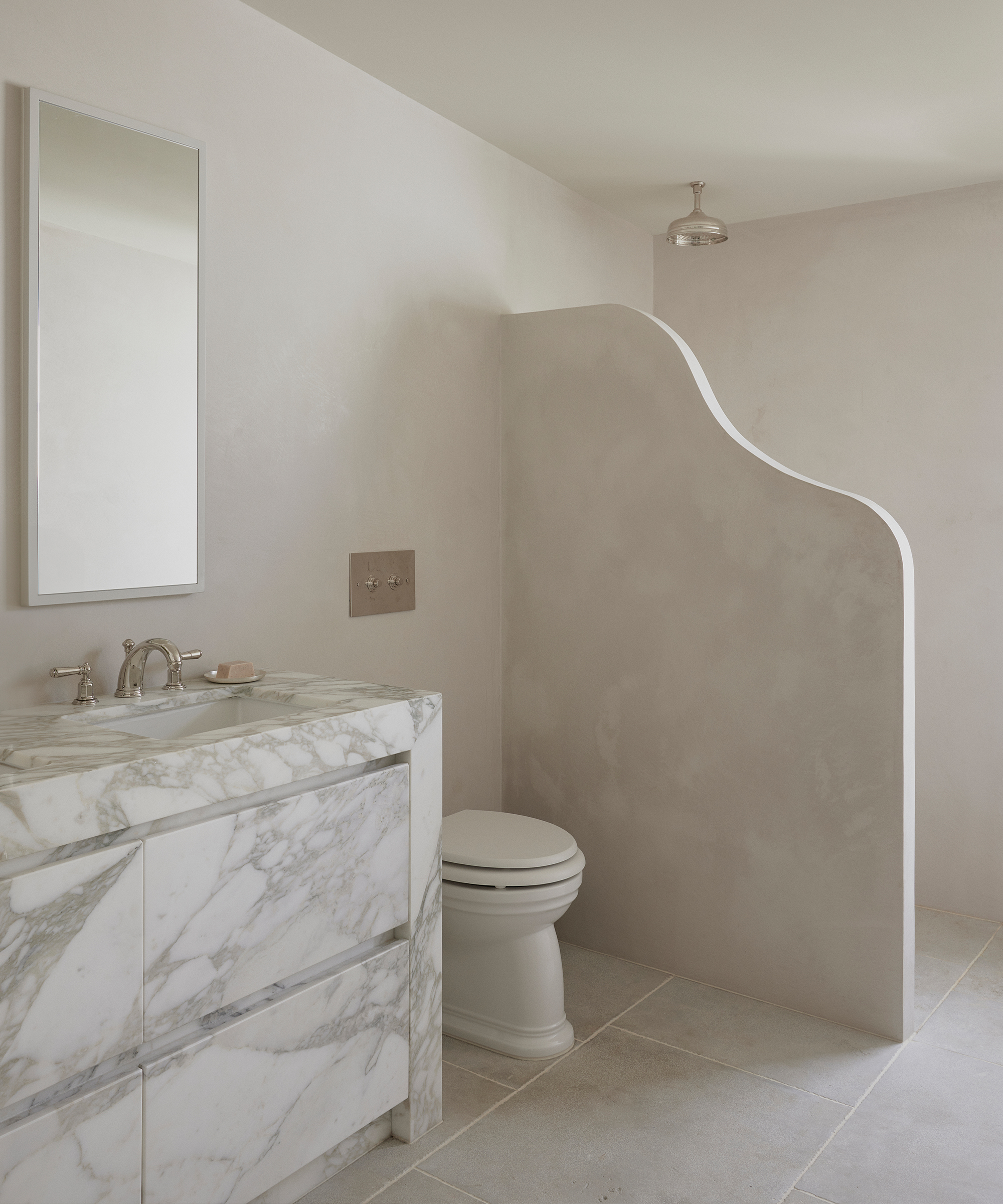 emily-gillis-home-tour-marble-vanity-stone-shower