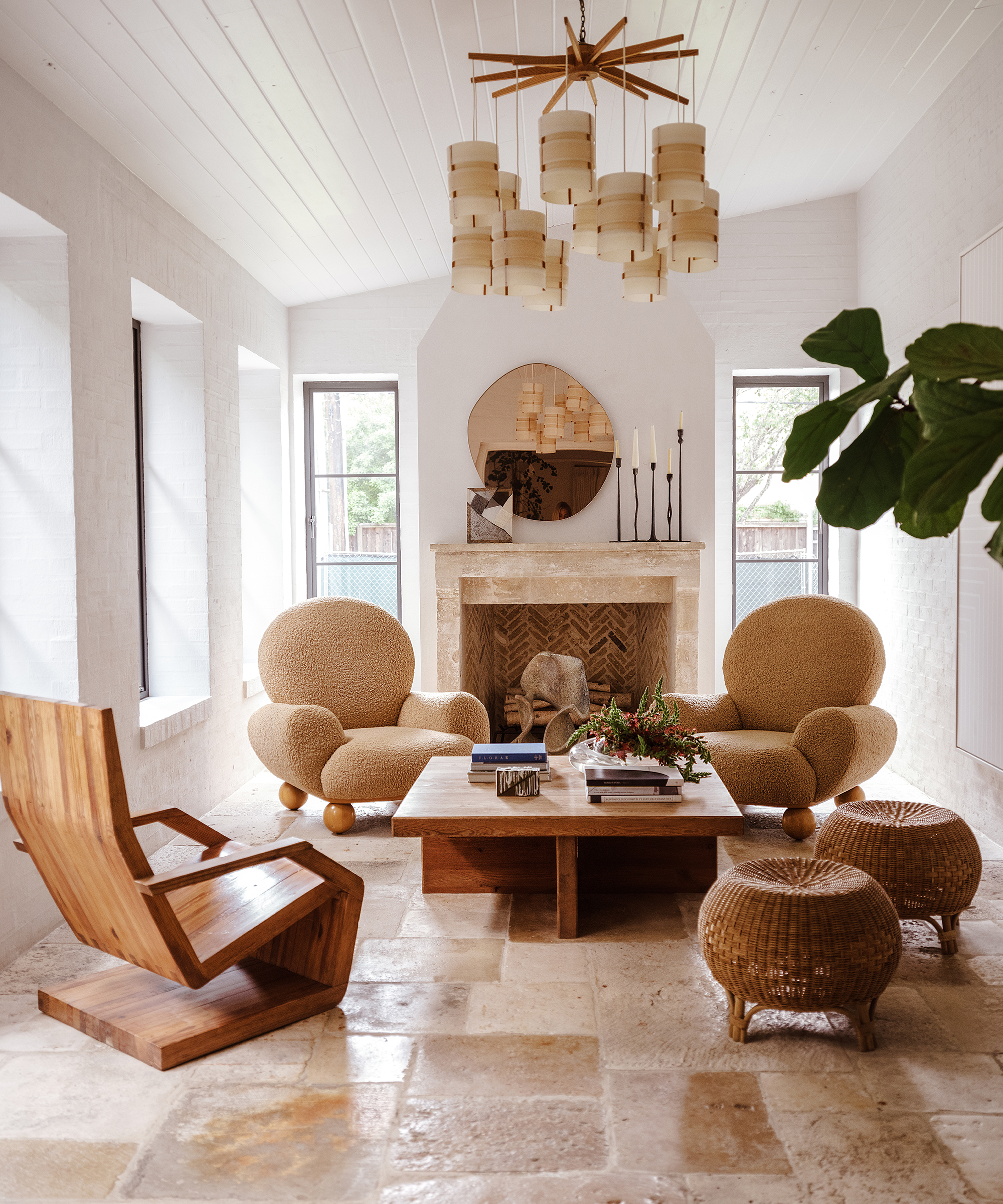 mnaeve-home-tour-sunroom-sherpa-accent-chairs-fireplace