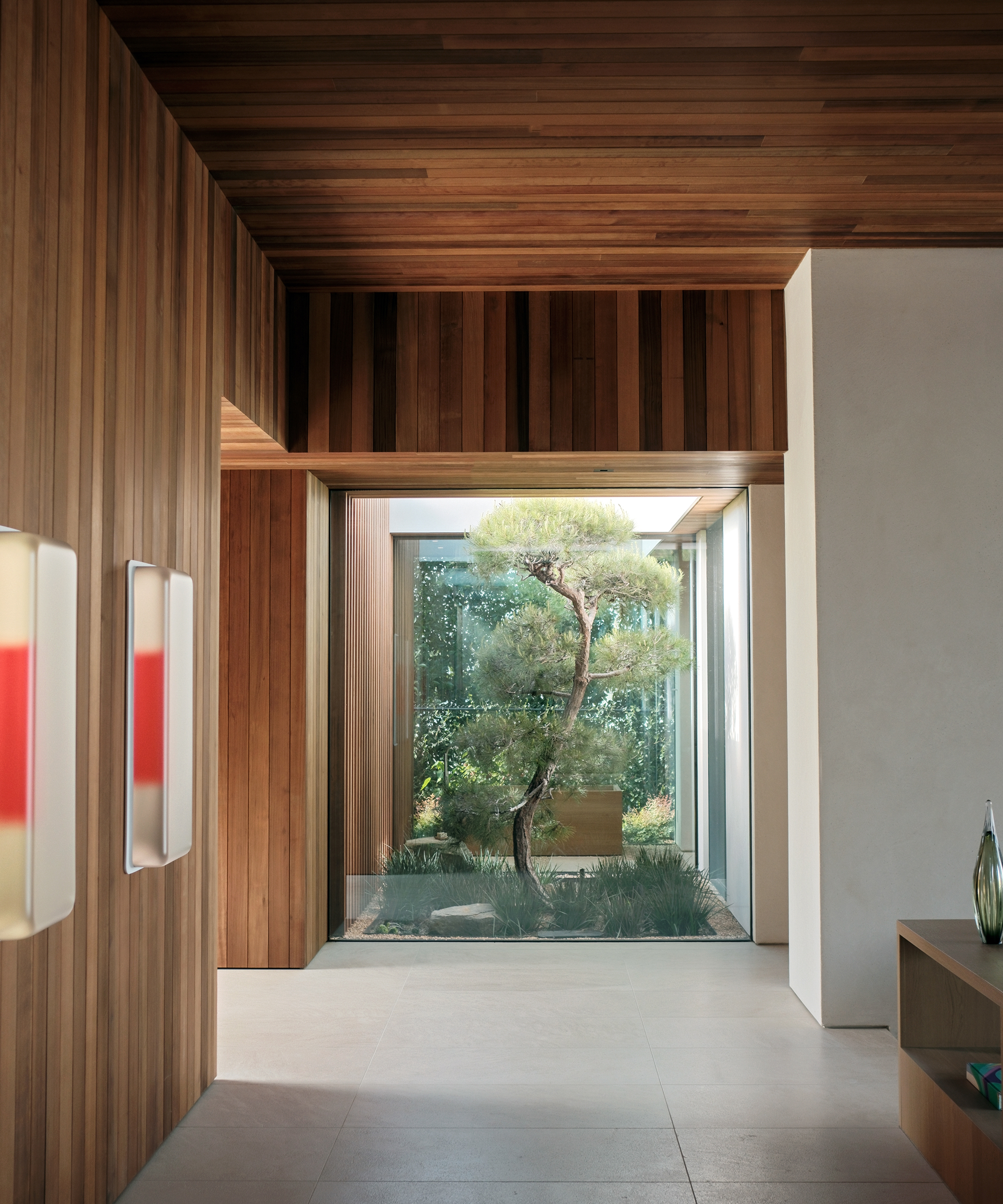 montalba-architects-home-tour-hallway-art-outdoor-tree