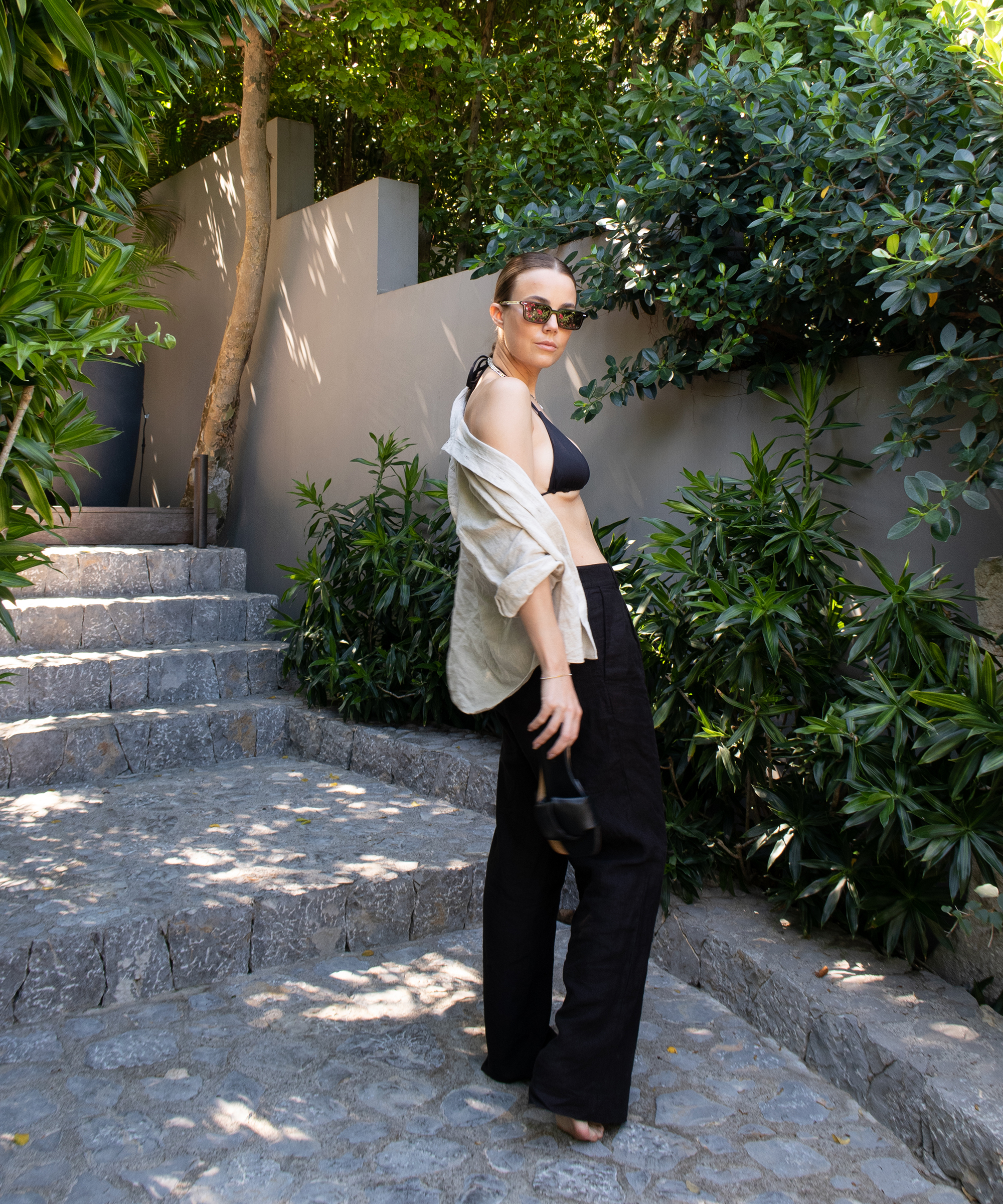 rebecca-rittenhouse-olivia-ivey-in-uniform-st-barths-linen-kyle-trouser-linen-shirt-walking