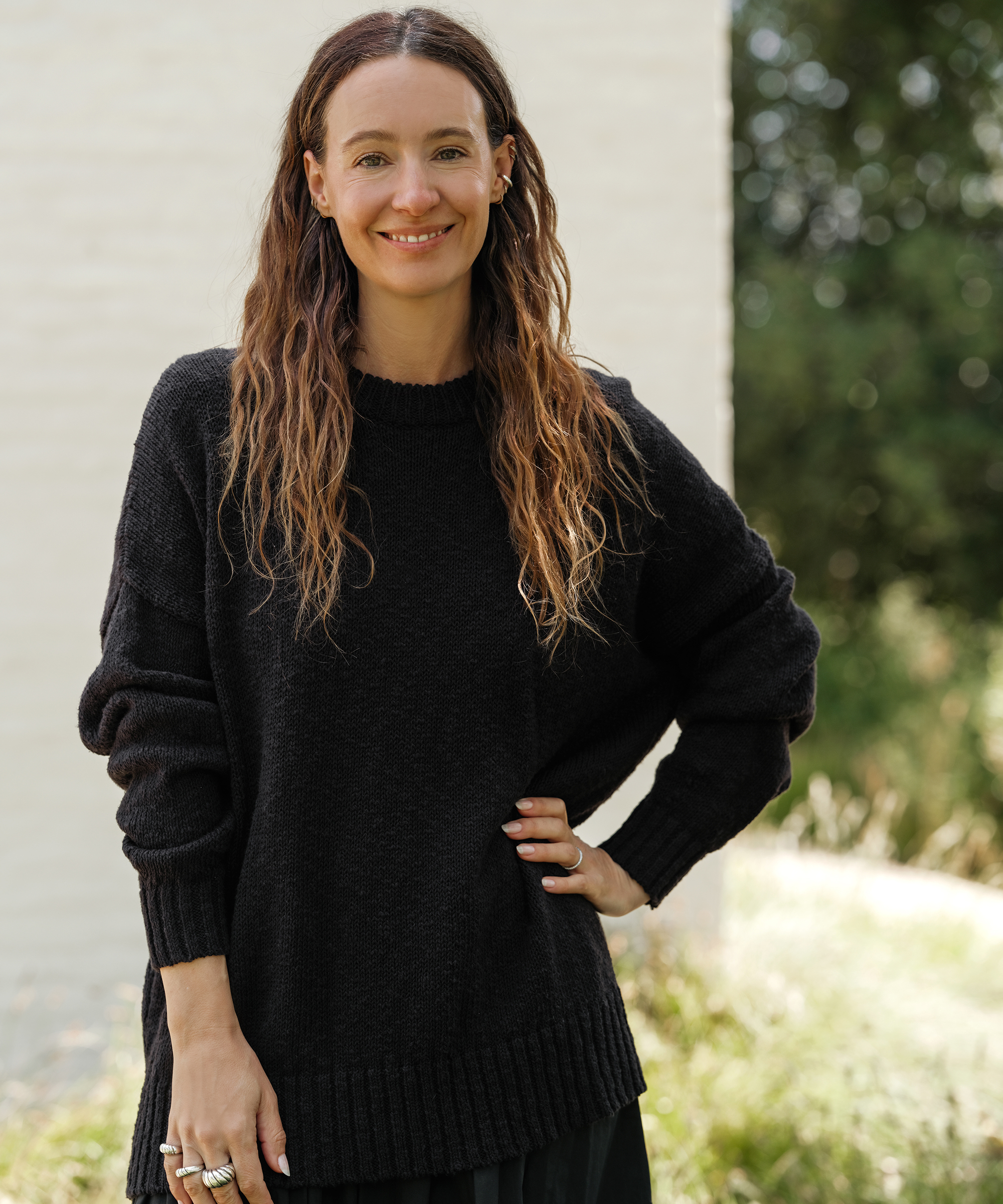 jenni in a black cruise cocoon sweater