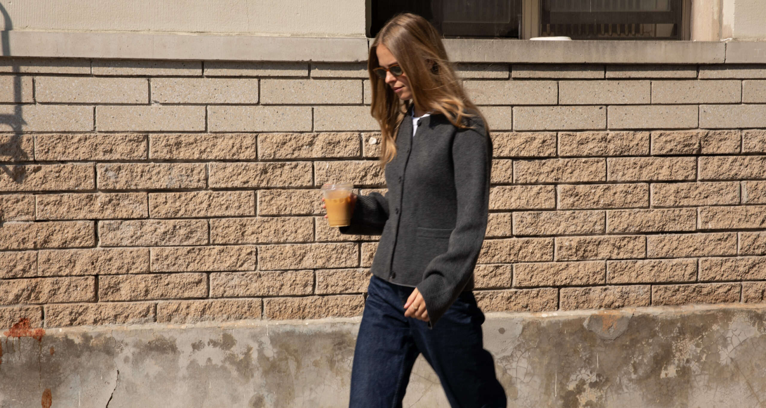 clara-dyrhauge-in-uniform-cooper-cardigan-walking-street