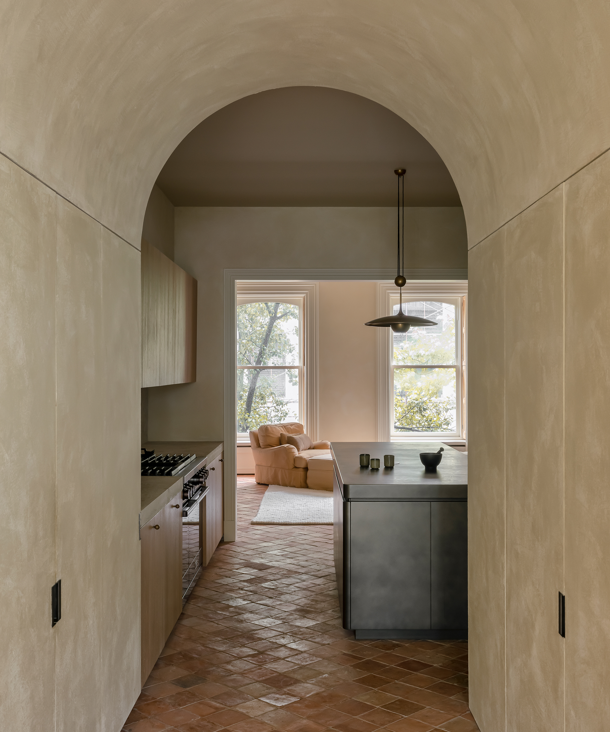 nicolas-schuybroek-home-tour-kitchen-arched-hallway