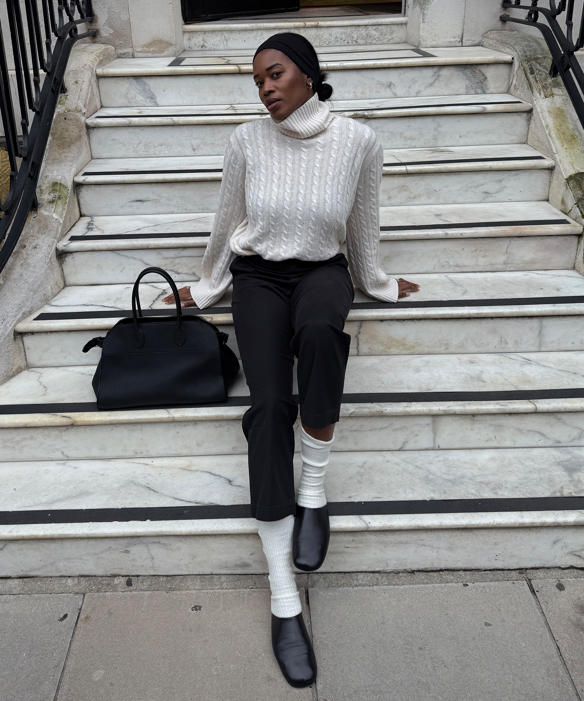 nl-marilyn-in-uniform-cable-nell-turtleneck-sitting