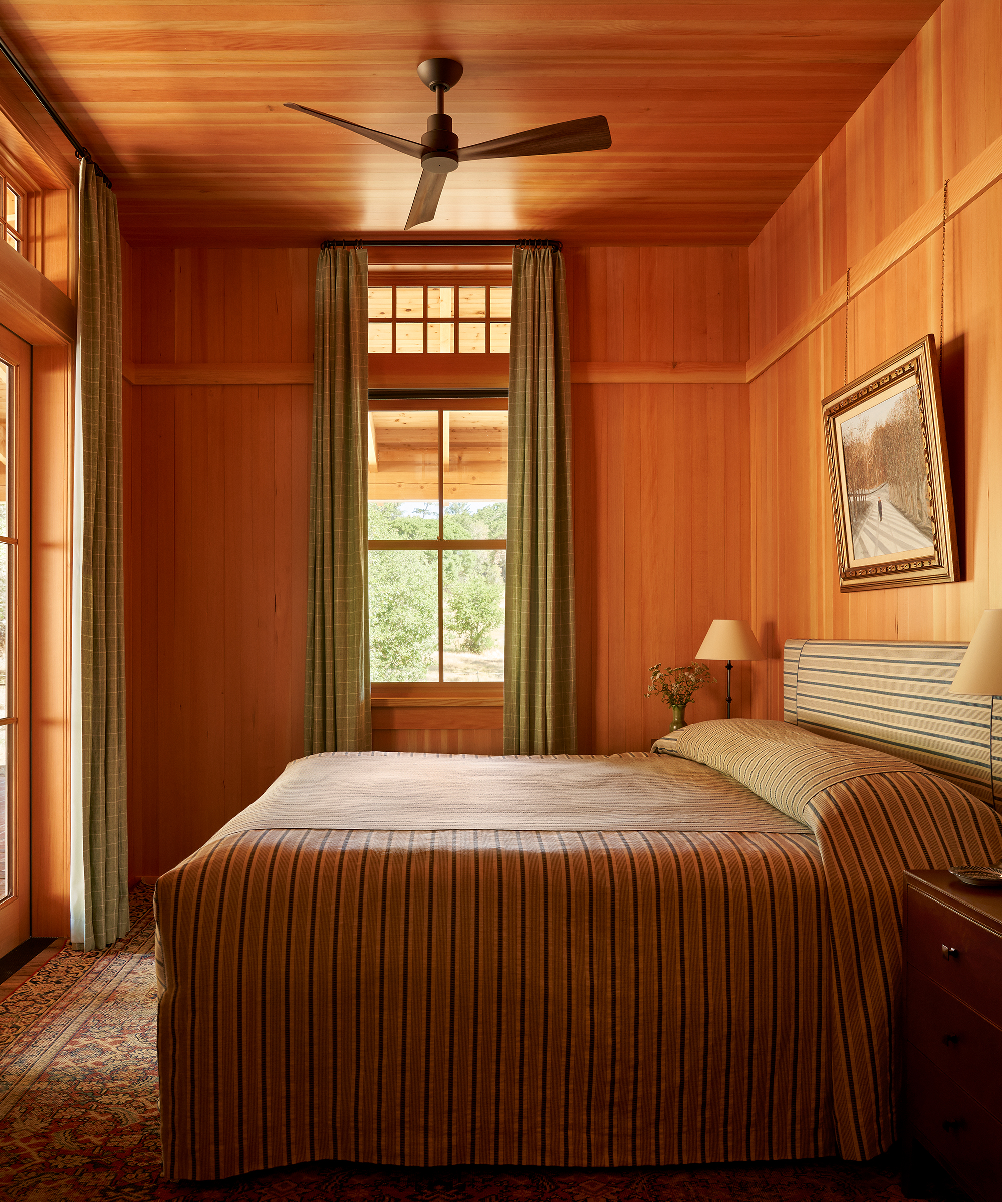 studio-dorian-home-tour-bedroom-striped-bedding