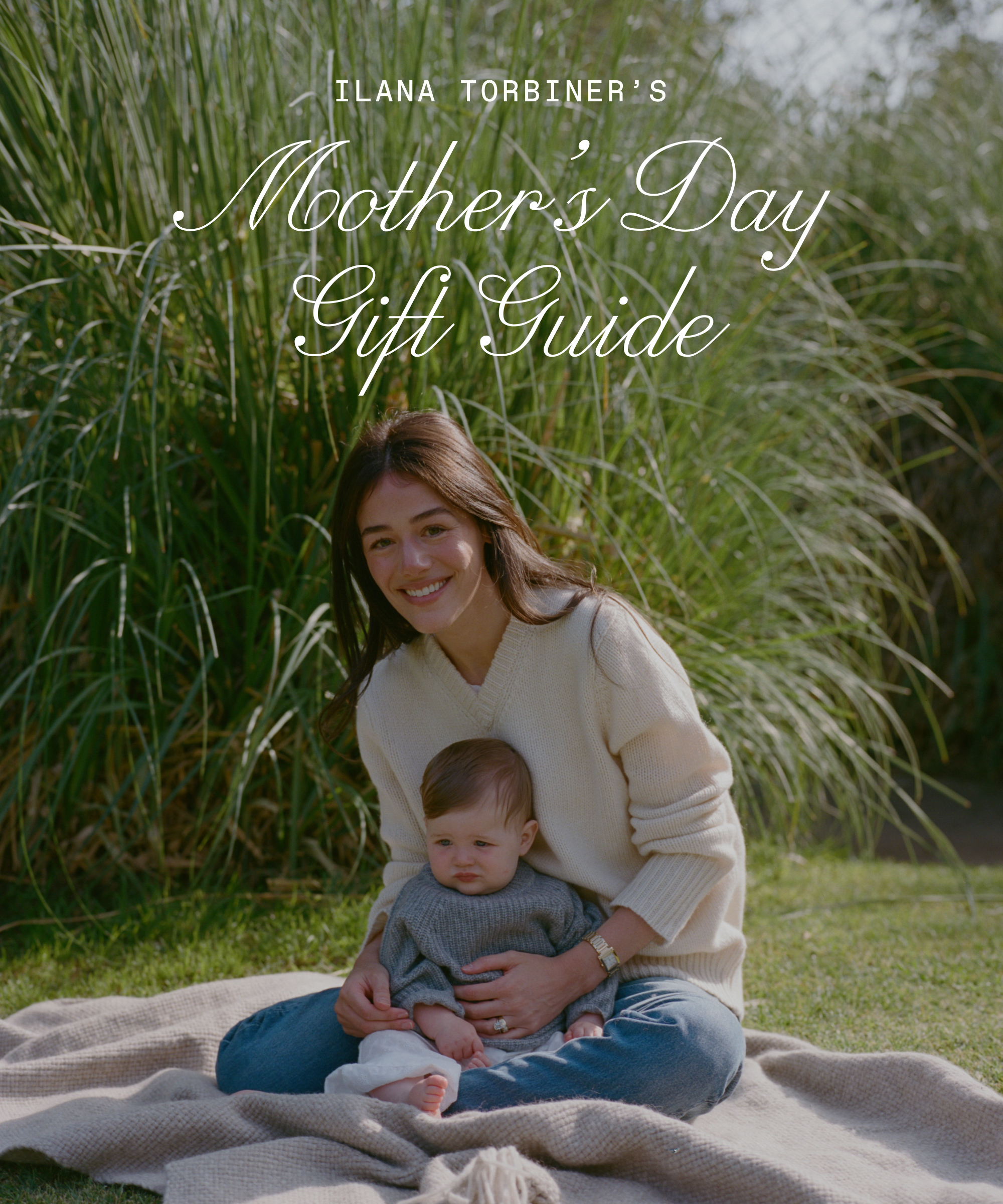 ilana torbiner wearing an ivory cashmere vneck and denim on a cashmere blanket outside